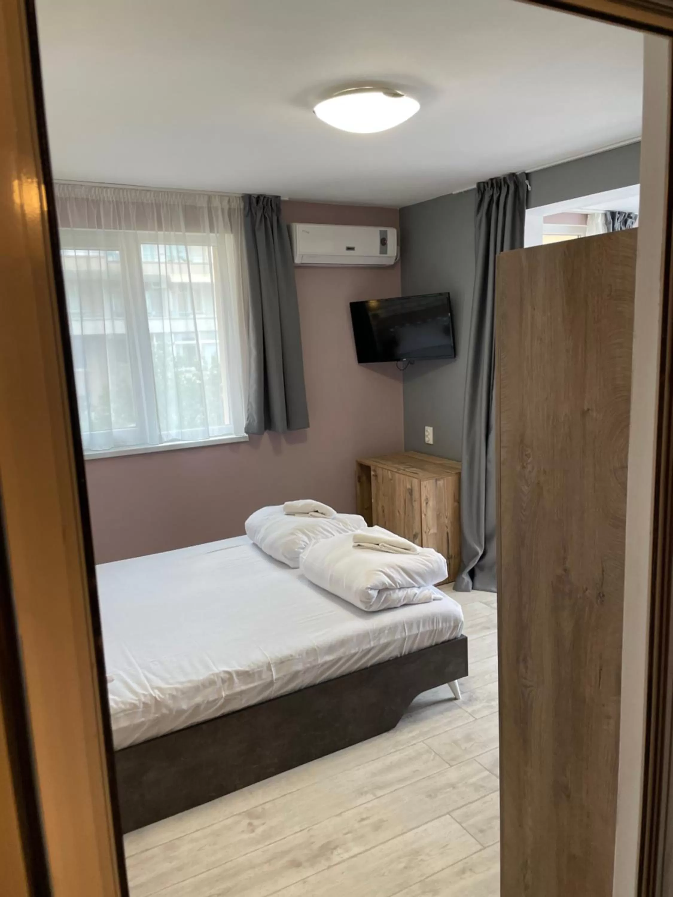 Bed in Family Hotel Malibu