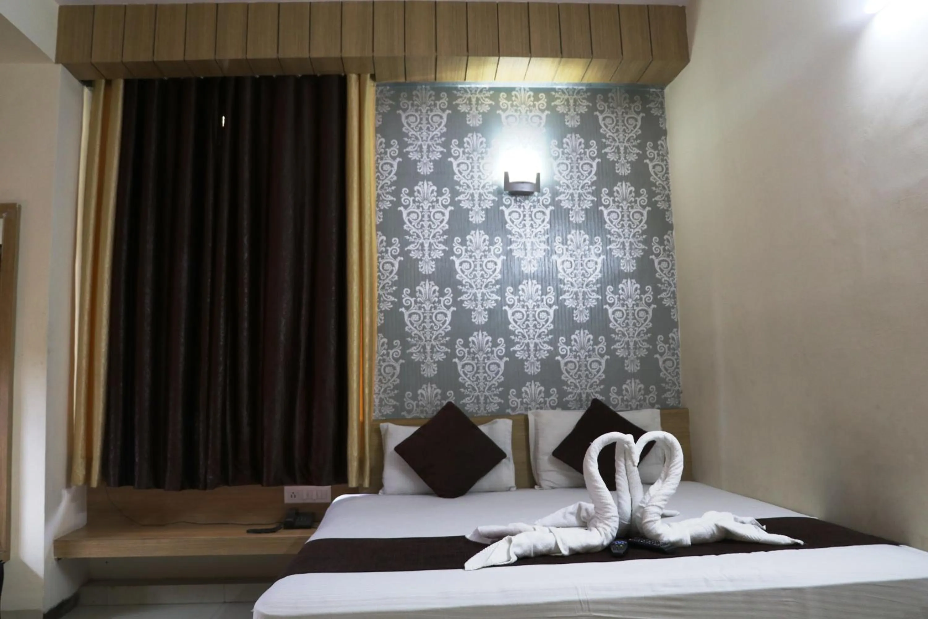 Bed in Hotel Vaishnavi