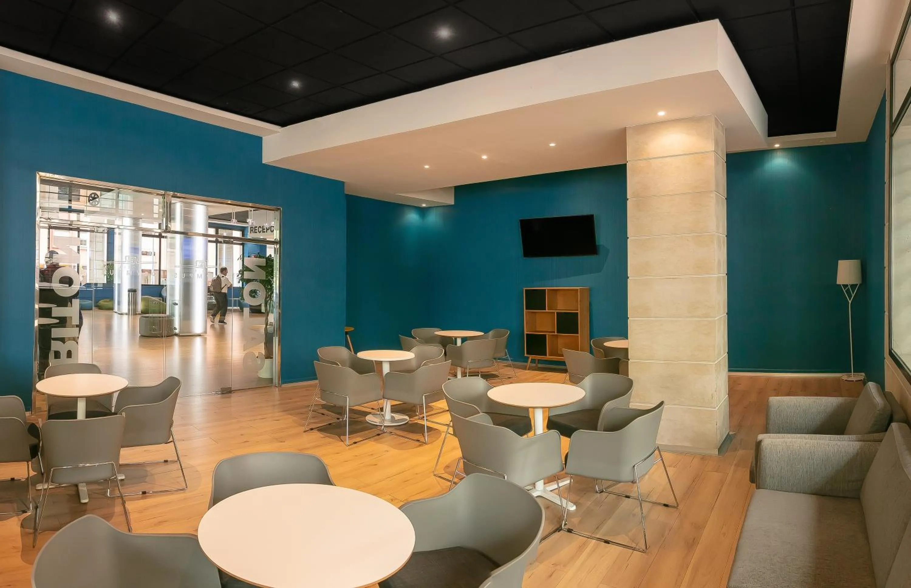 Communal lounge/ TV room in Hotel Olympus