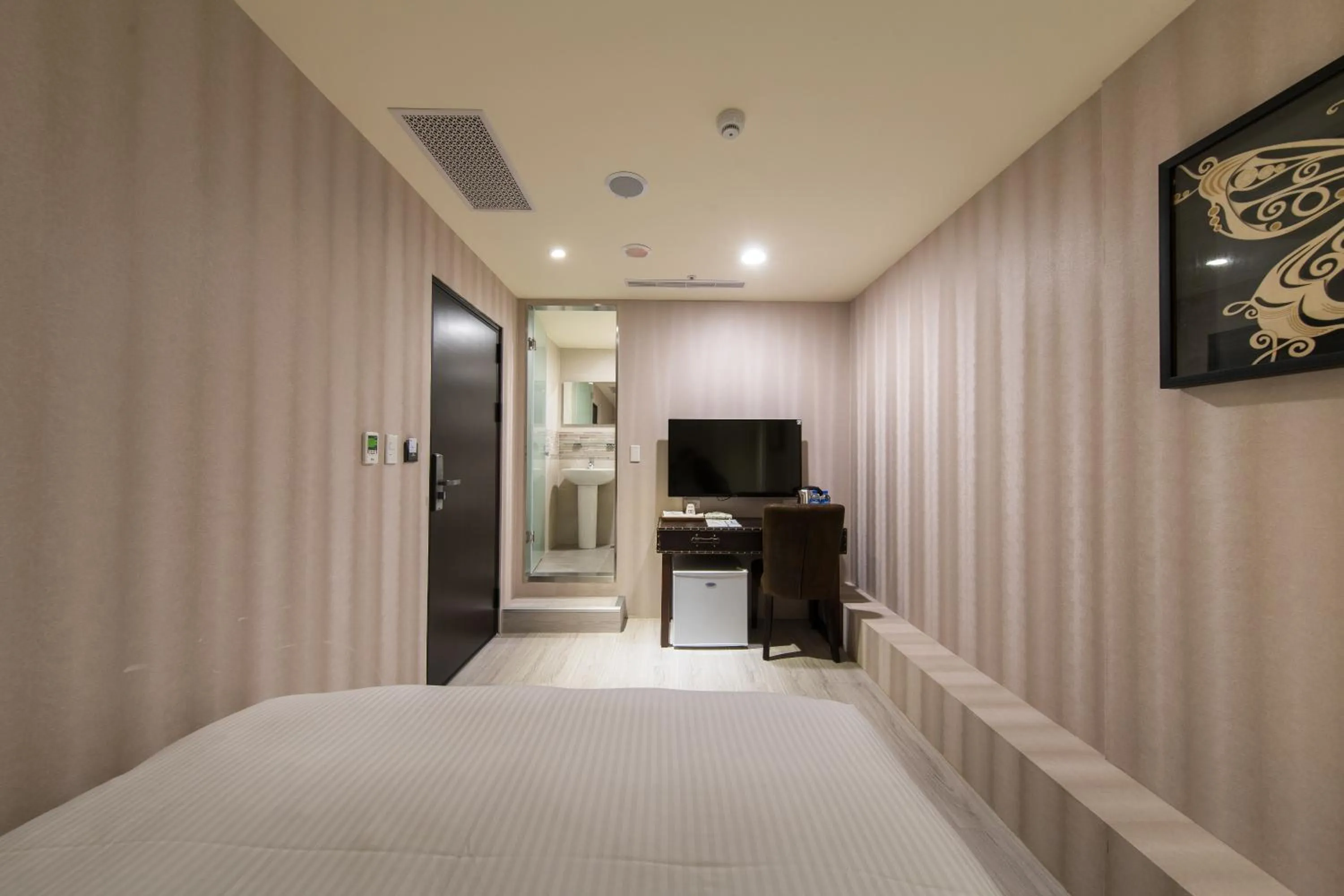 Photo of the whole room, Bed in XinsheHotel - Chungli