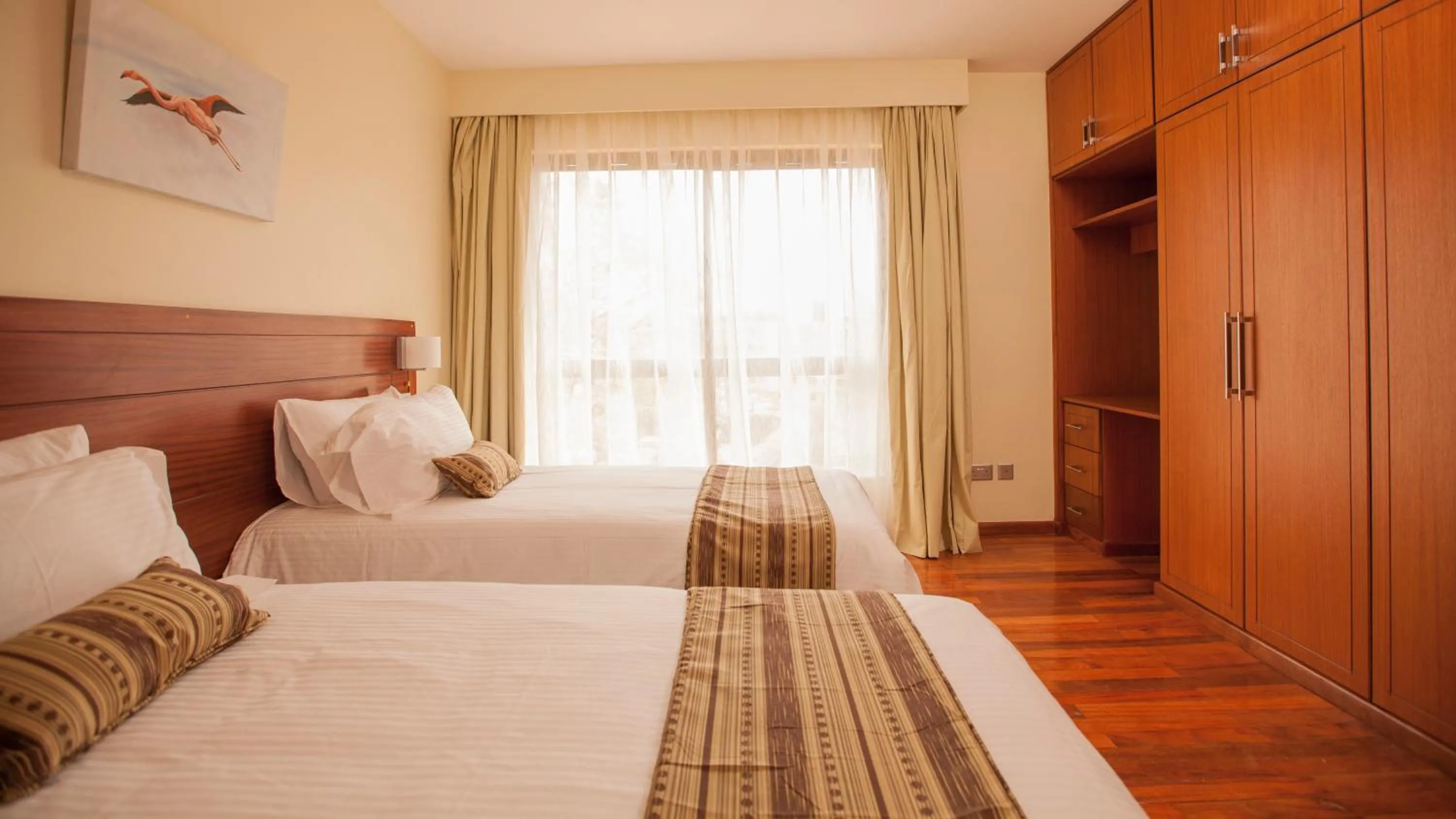 Bedroom, Bed in Waridi Paradise Hotel and Suites