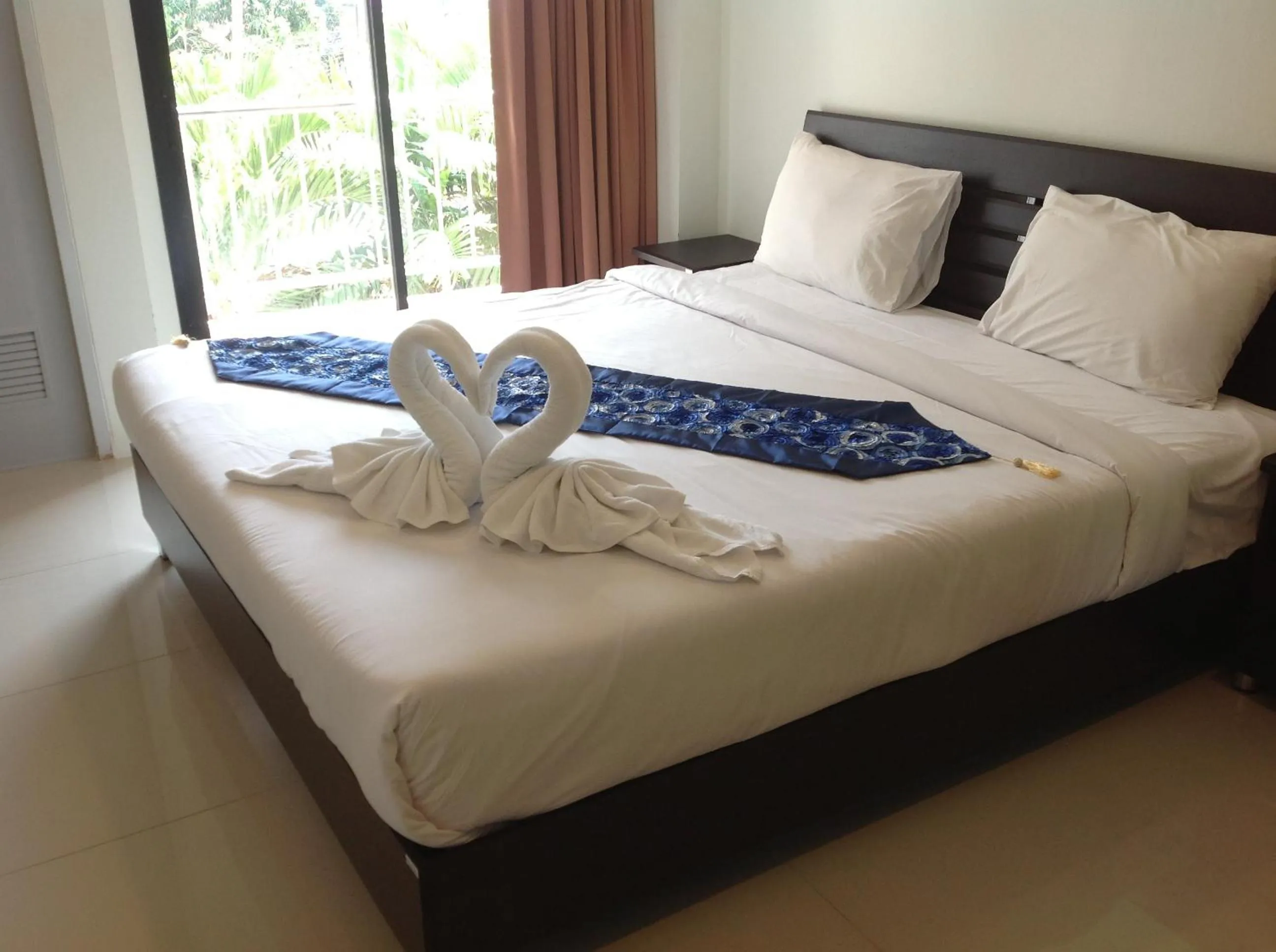 Bed in The Wave Hotel Patong SHA