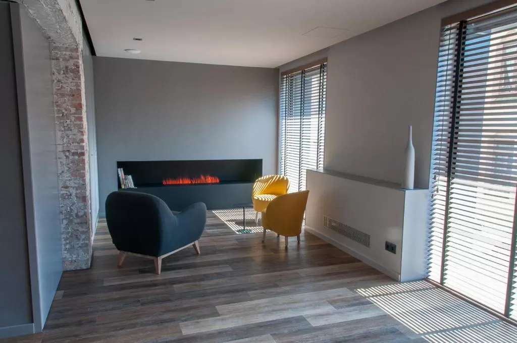 Communal lounge/ TV room in Hotelet de Sant joan