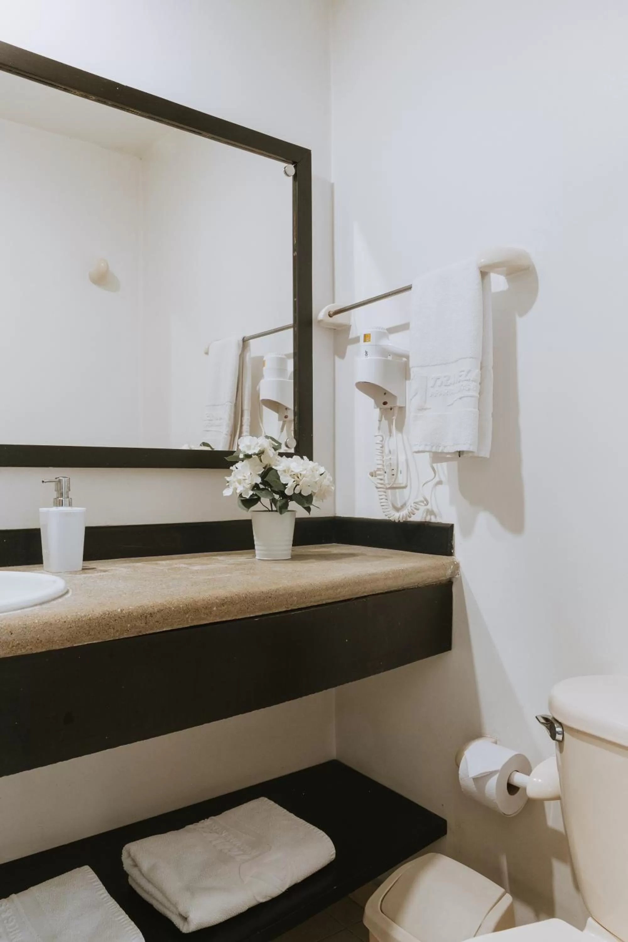Bathroom in Travelers Orange Suites