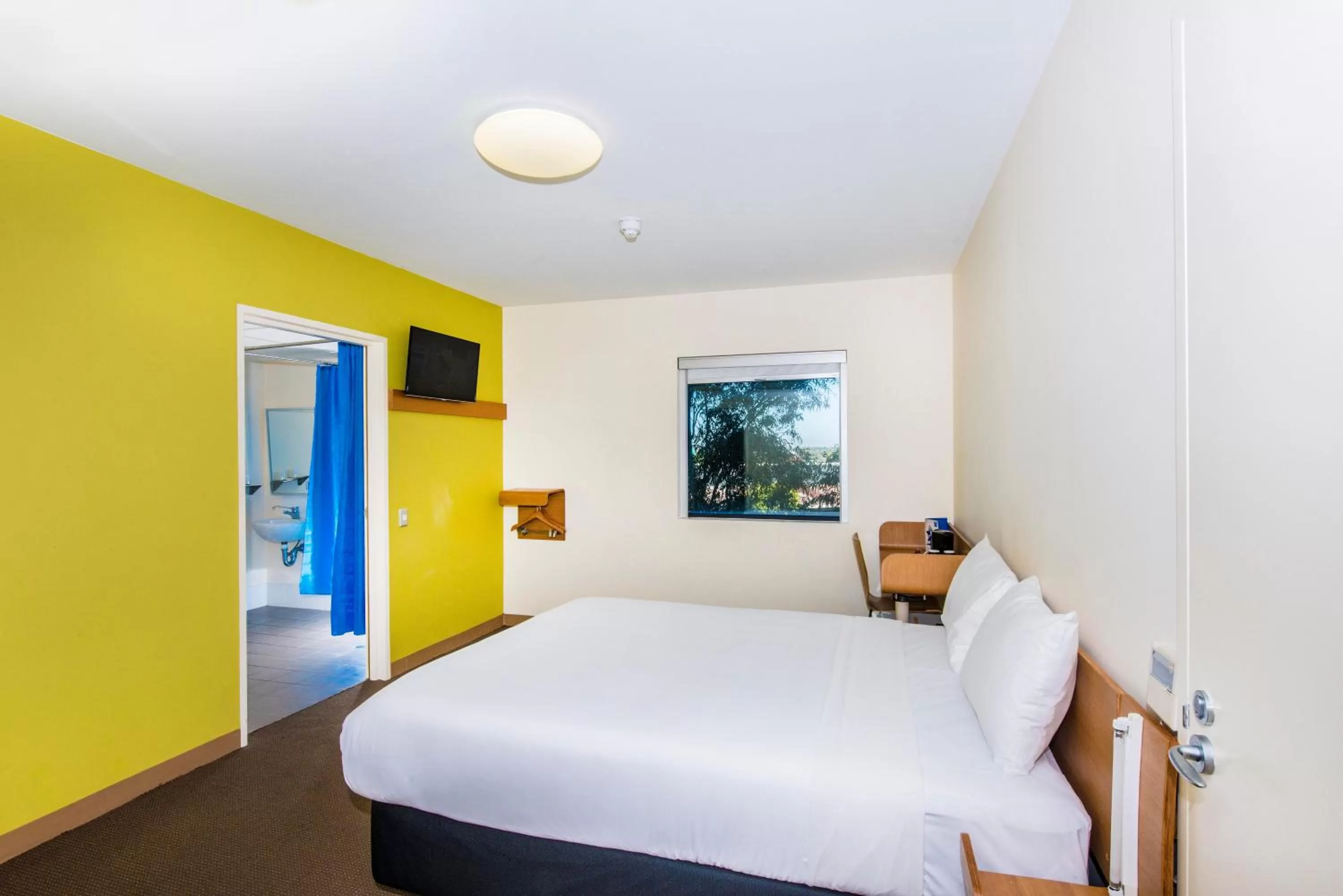 Bed in ibis Budget Sydney Olympic Park