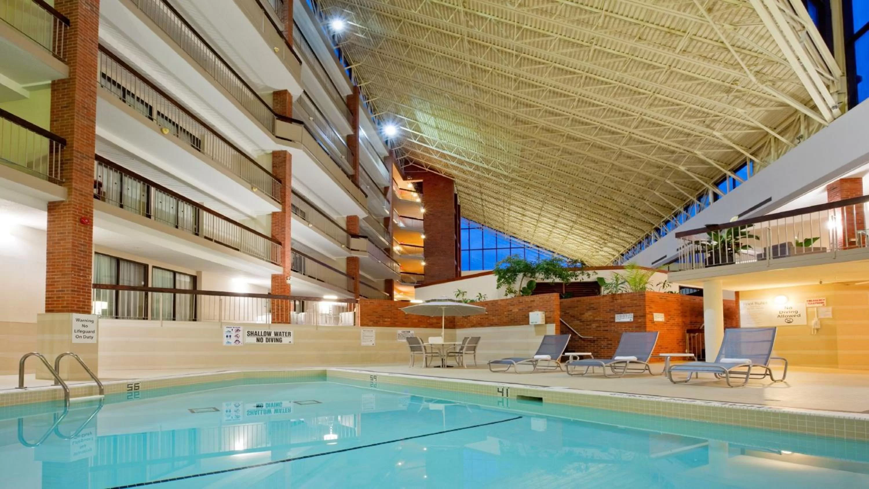 Swimming pool in Holiday Inn Oakville Centre by IHG