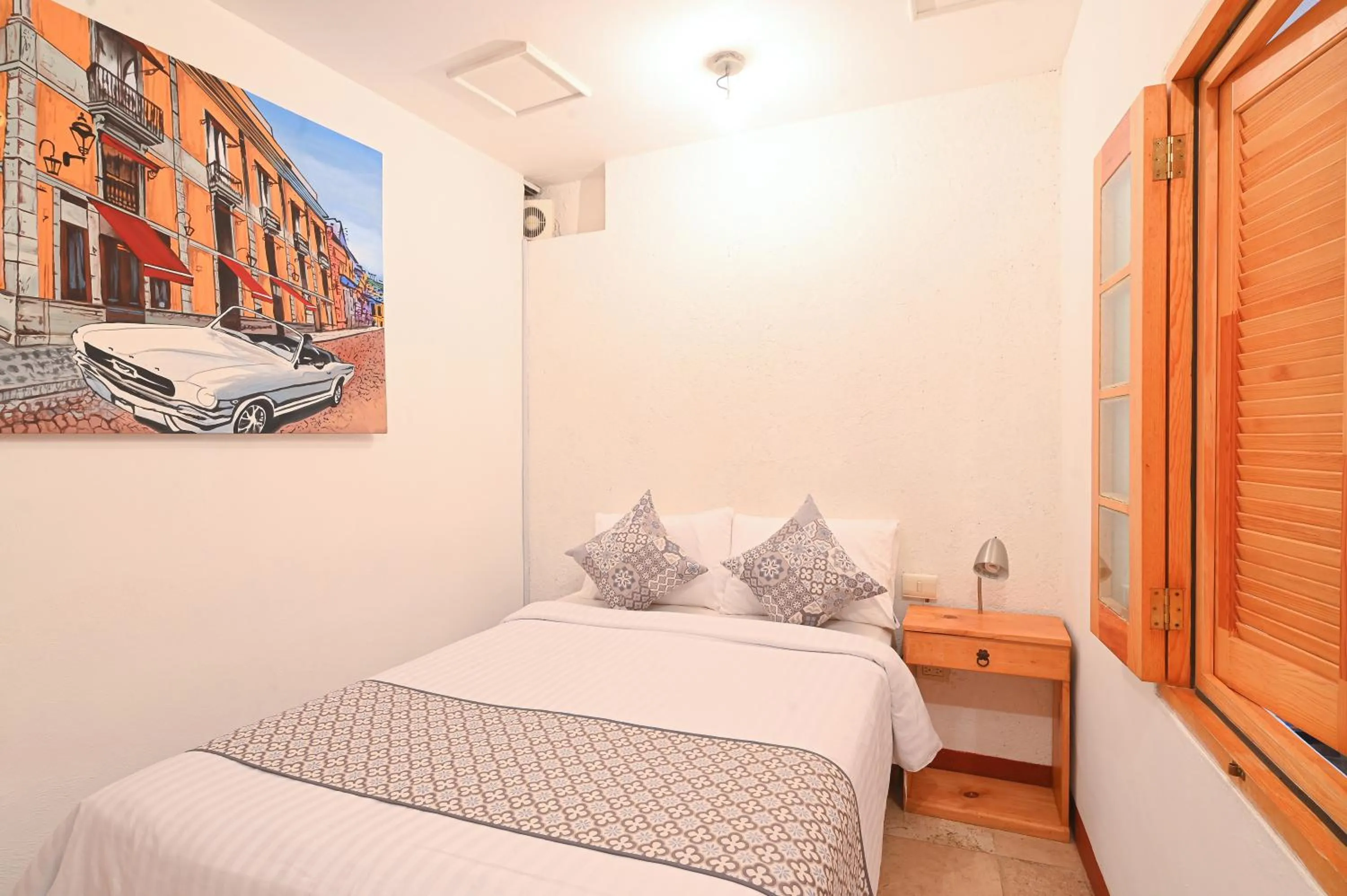 Bed in Hotel Meson Cuevano