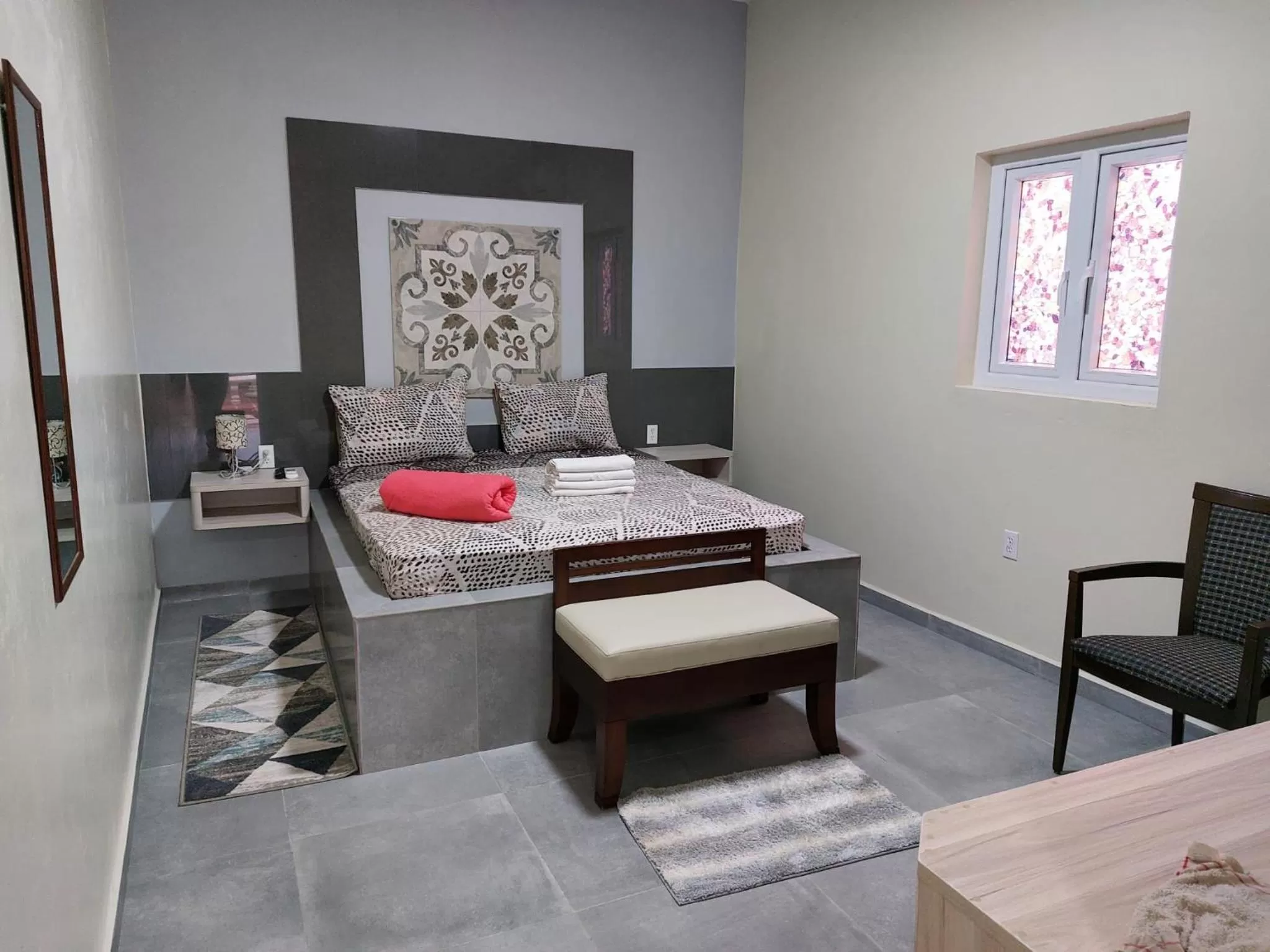 Bed in Curasita colour Appartments