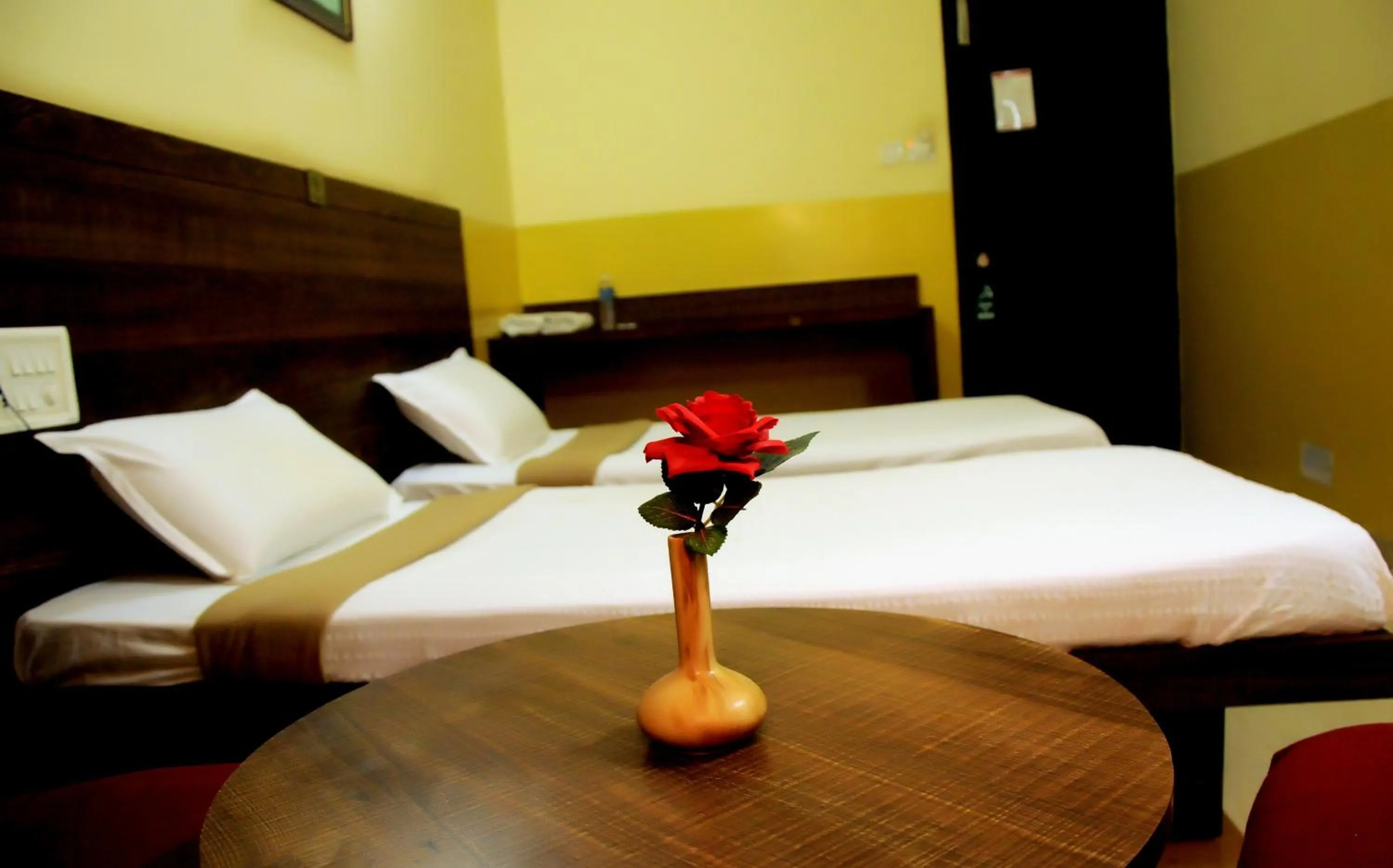 Bed in Suvarna Residency