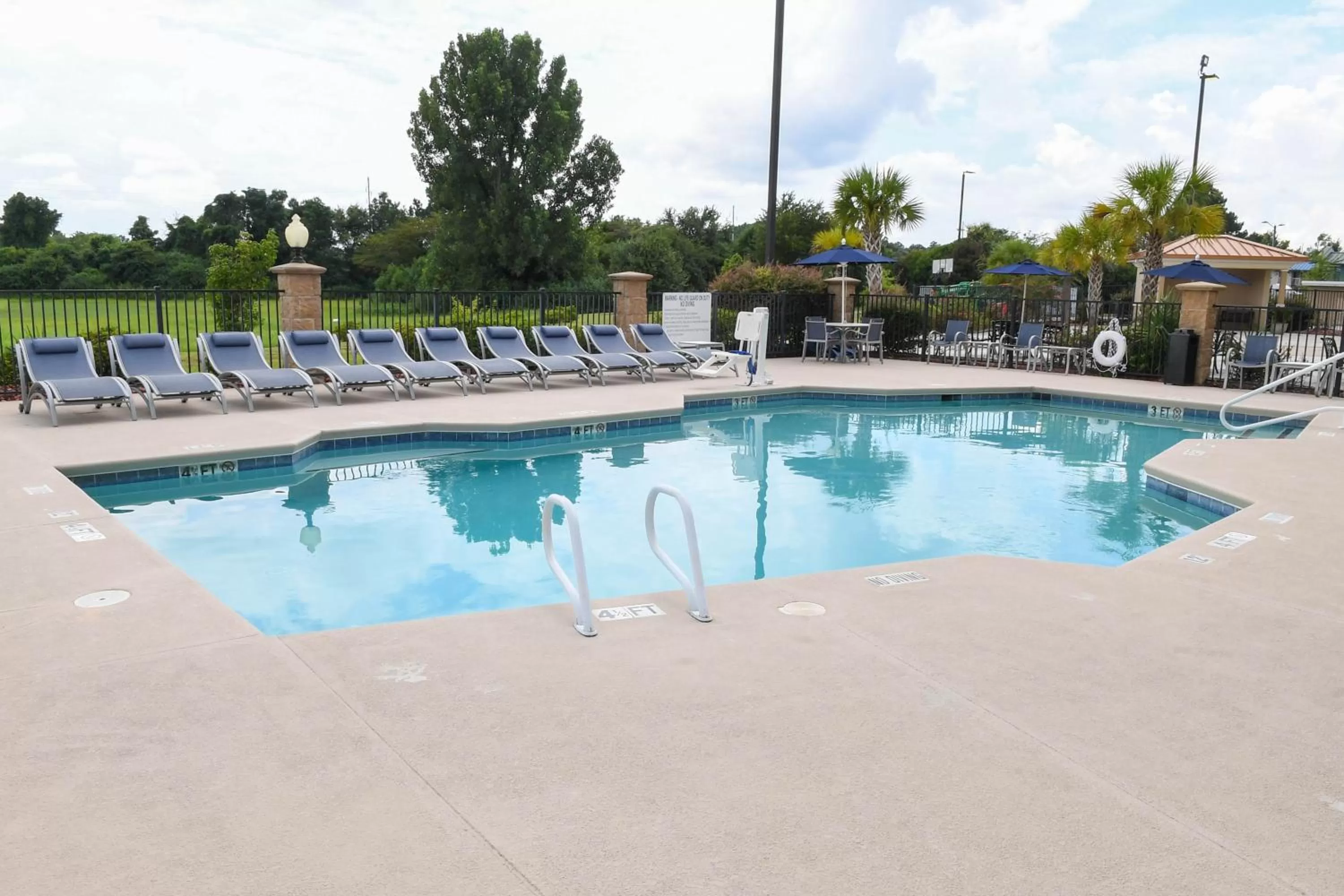 Swimming pool in Holiday Inn Valdosta Conference Center by IHG