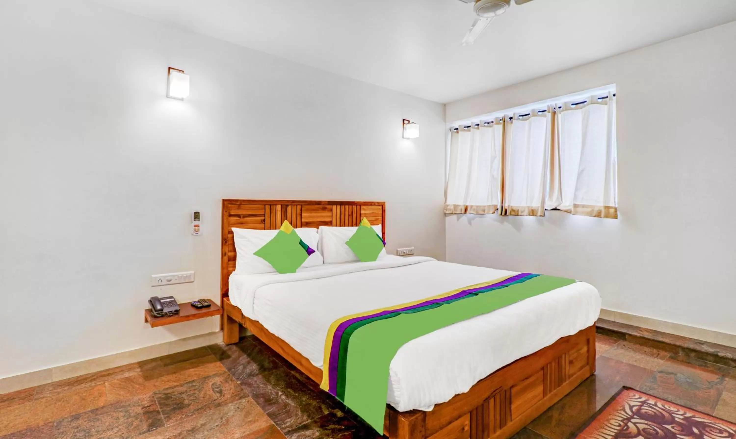 Bed in Treebo Benaka Residency