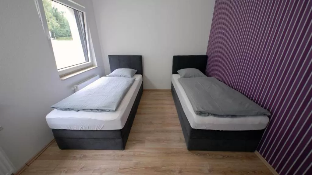 Bed in Kraftwerk Relax Motel