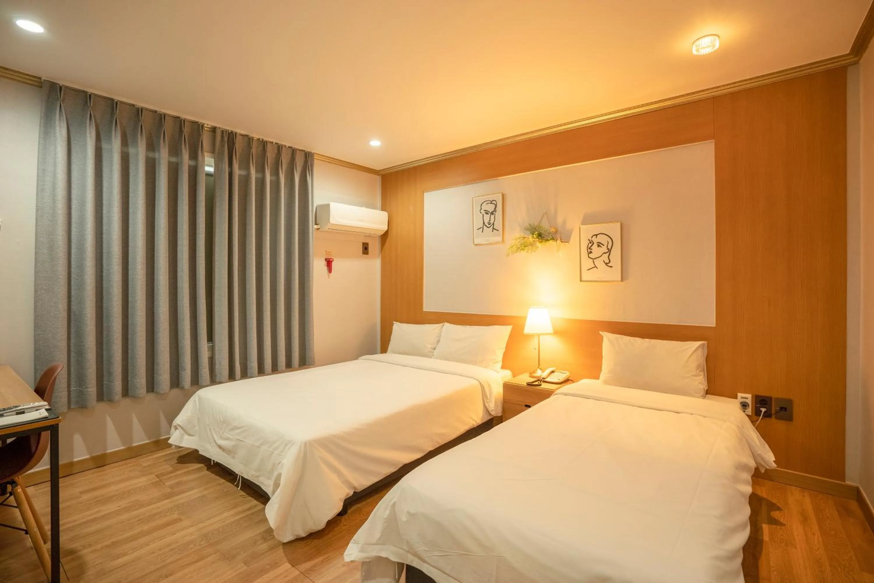 Bed in Jeju Stay Hotel