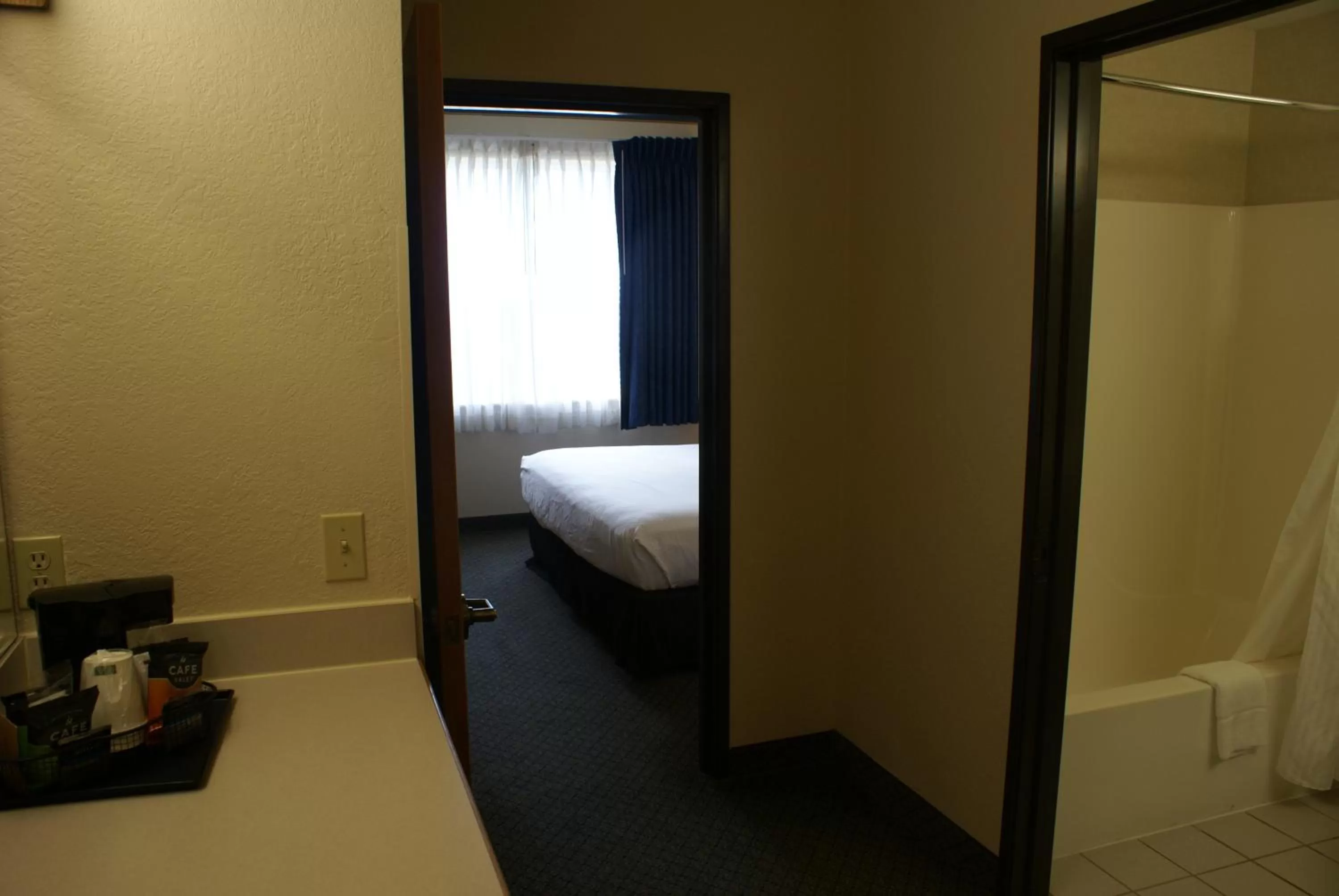 Bathroom, Bed in Country Inn & Suites by Radisson, Lansing, MI