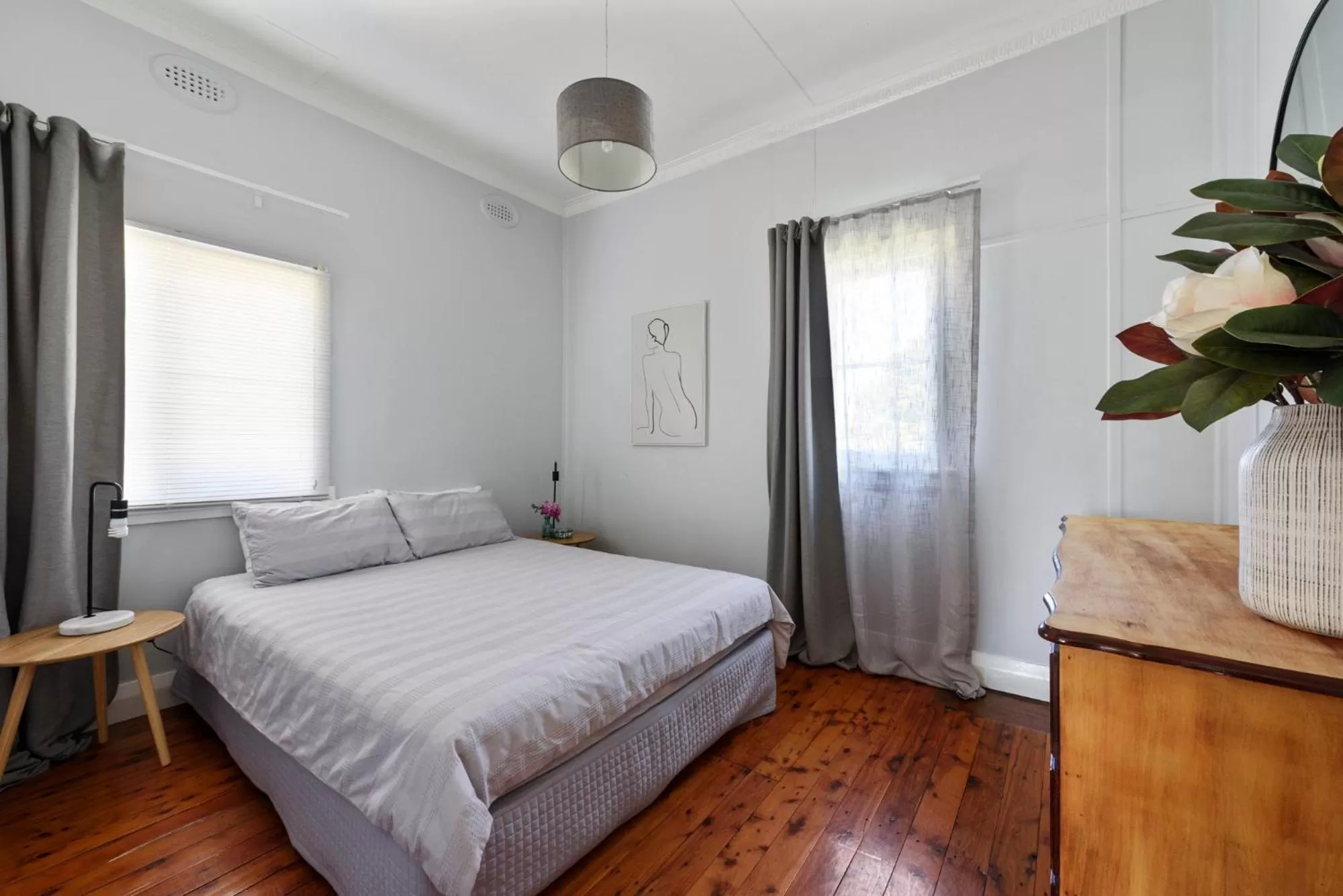 Bed in Calm Waters Waterfront Cottages