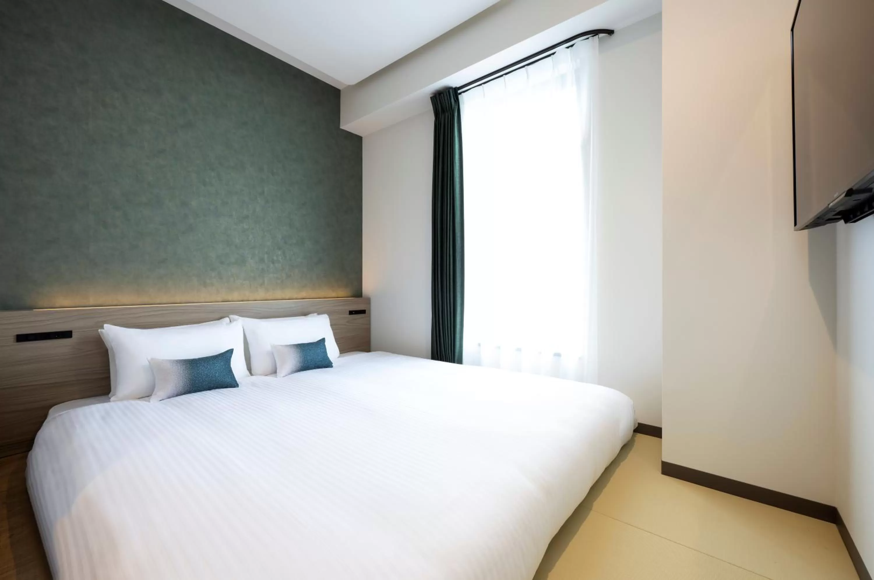 Photo of the whole room, Bed in HOTEL AMANEK Shinjuku Kabukicho