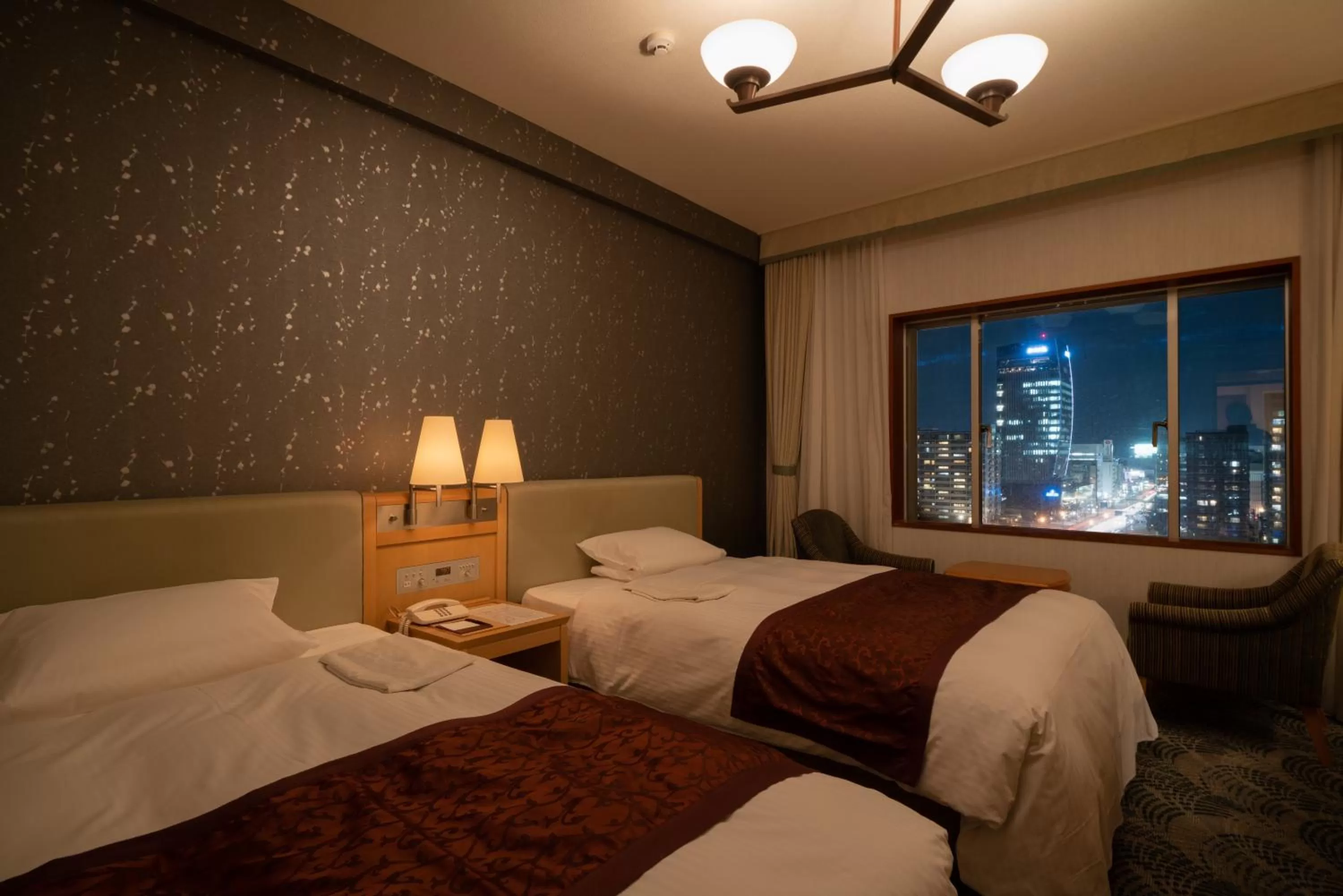 Bed in Hotel Okura Niigata