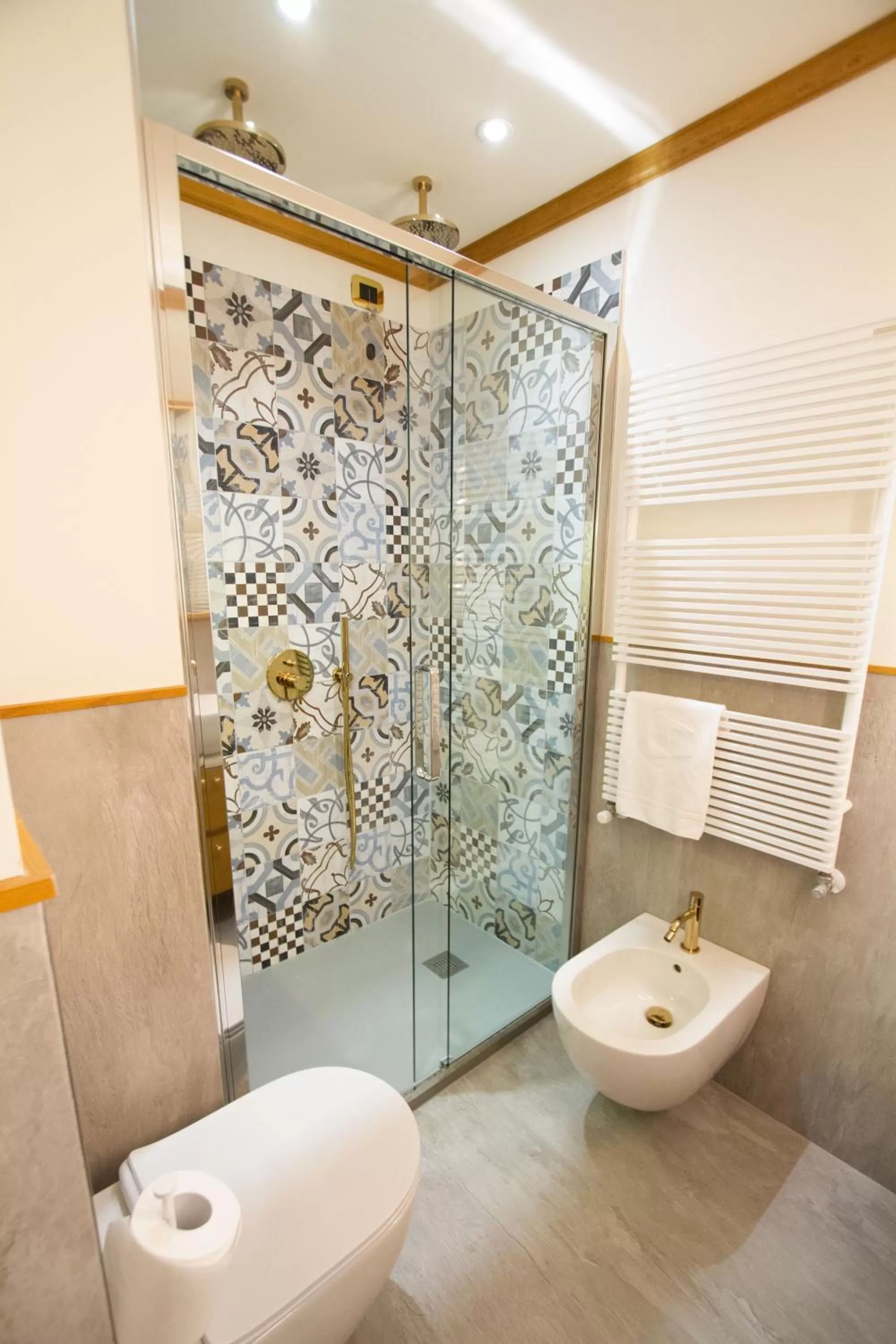 Bathroom in Ambra Cortina Luxury&Fashion Hotel