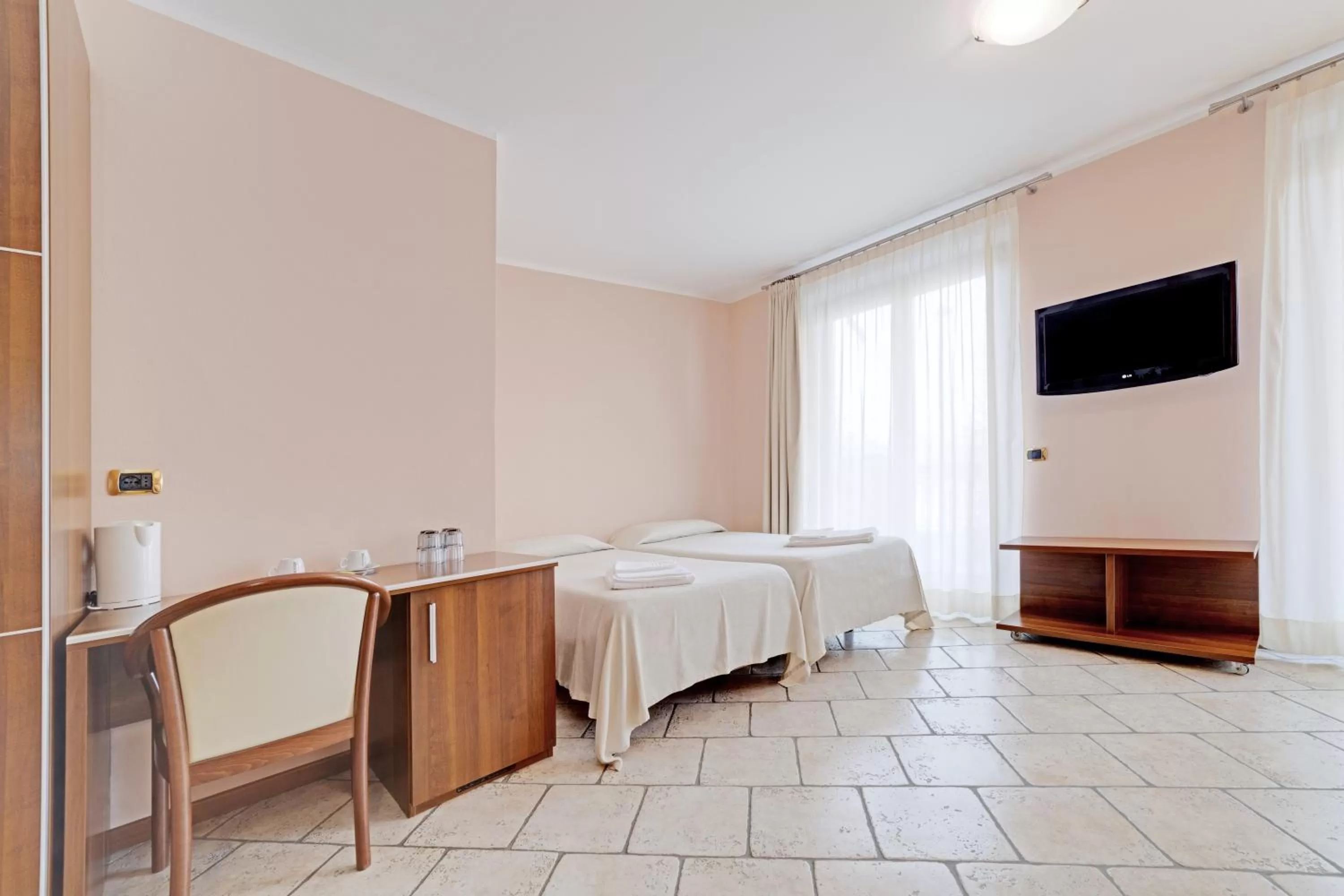 Bed in Hotel Grotto Bagat