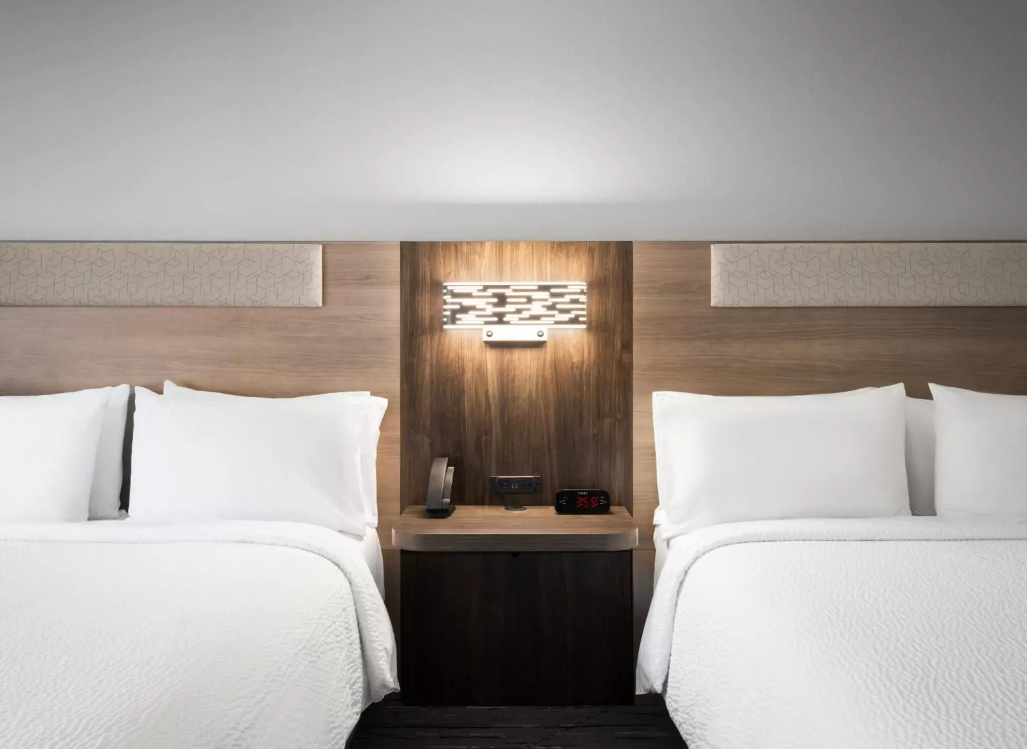 Standard Queen Room with Two Queen Beds and Mobility Accessible Tub in Holiday Inn Express Indianapolis Airport by IHG Standard Queen Room with Two Queen Beds and Mobility Accessible Tub in Holiday Inn Express Indianapolis Airport by IHG