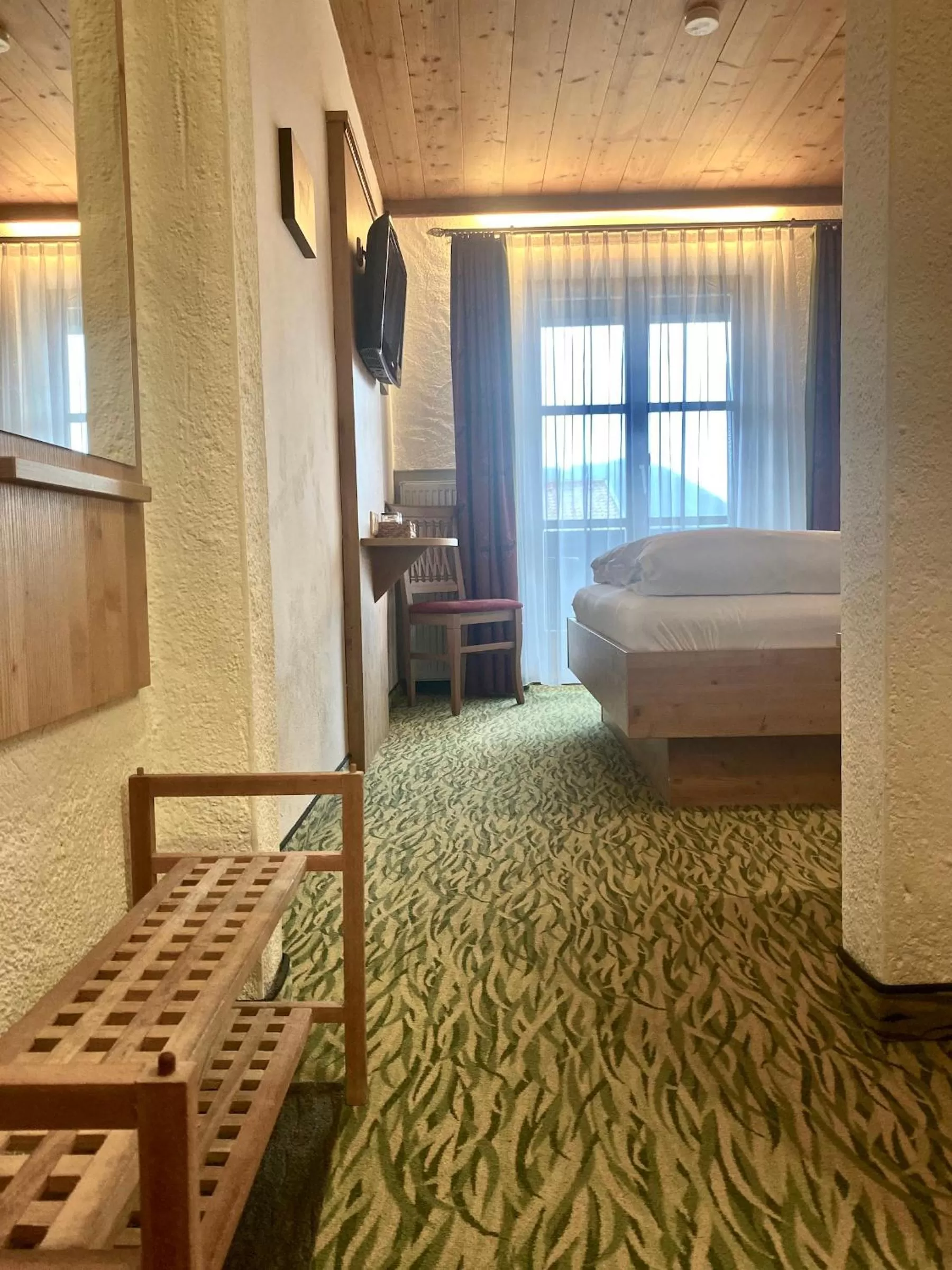 Photo of the whole room, Bed in Das Maximilian - Feines Landhotel am Schliersee