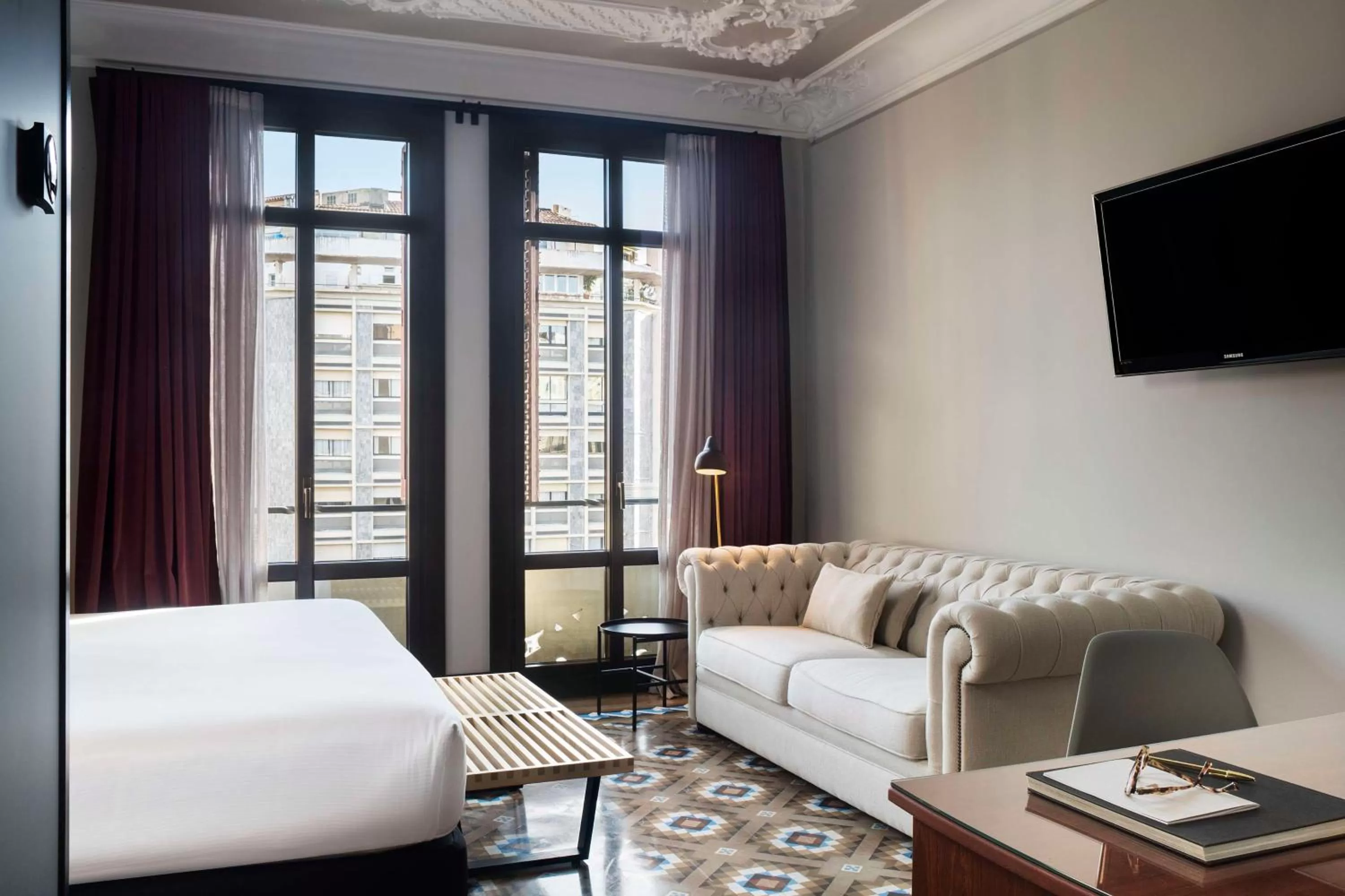 Living room, Bed in Alexandra Barcelona Hotel, Curio Collection by Hilton