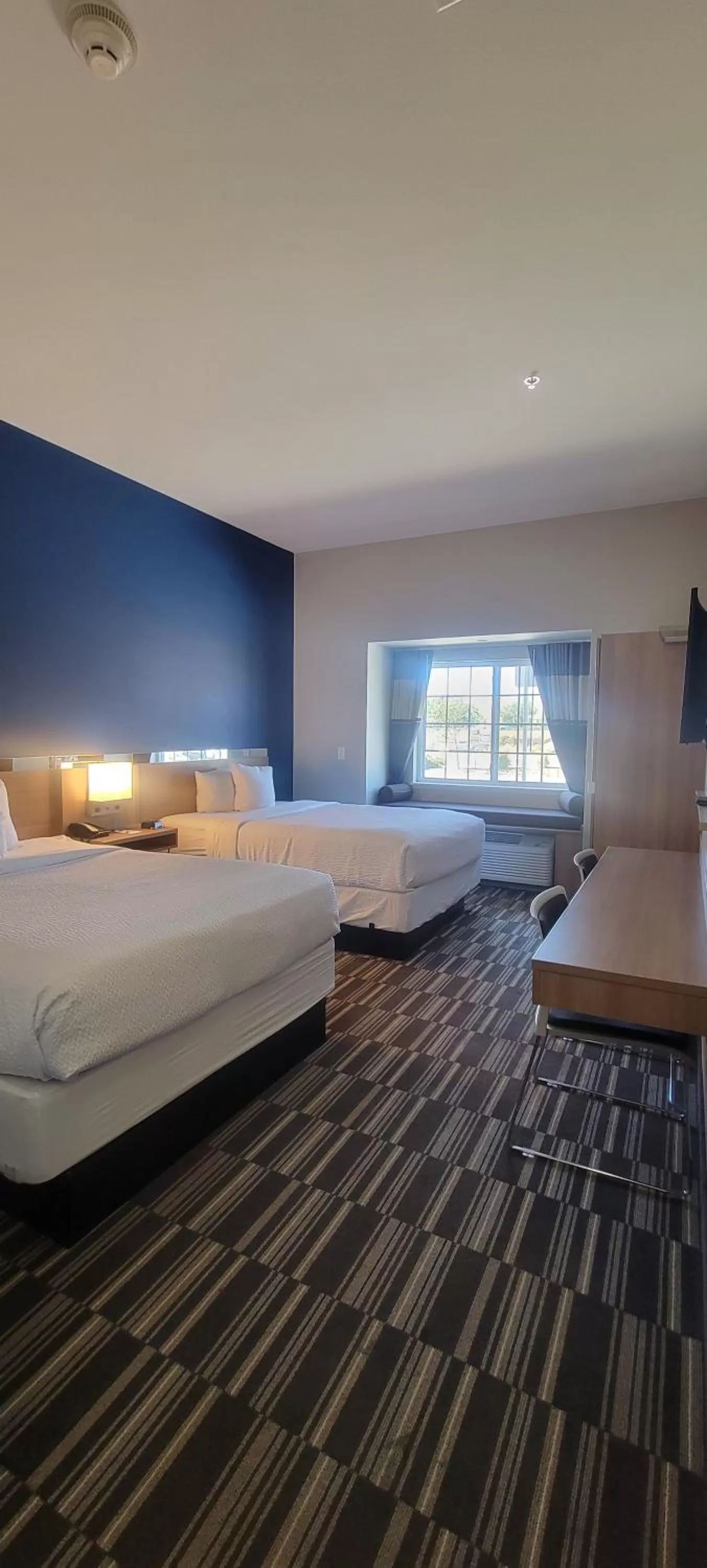 Bedroom in Microtel Inn & Suites by Wyndham Fountain Fort Carson