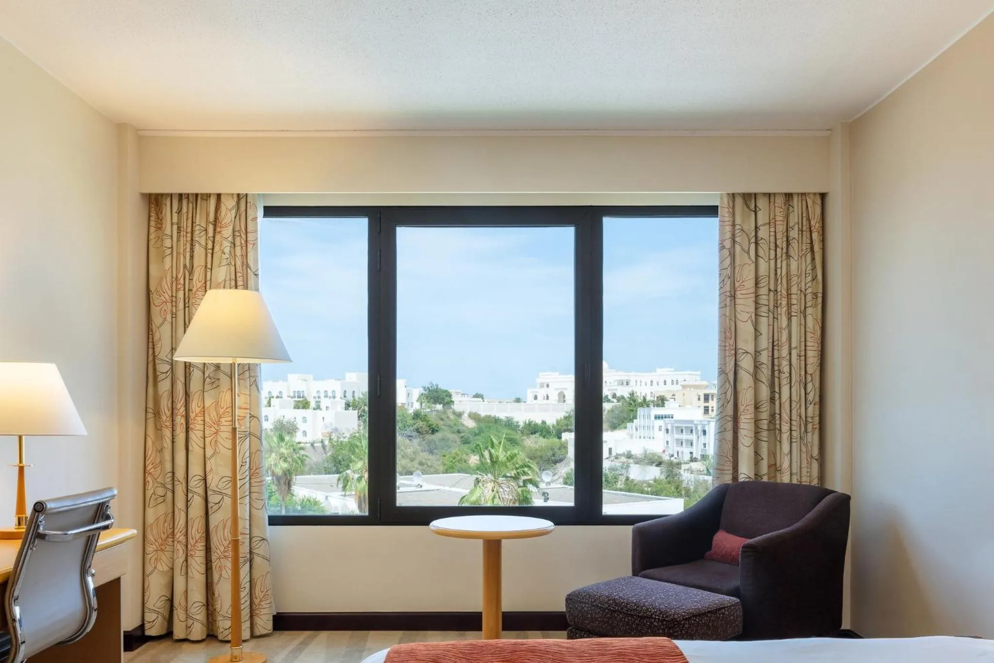 Photo of the whole room, Bed in Crowne Plaza Muscat by IHG