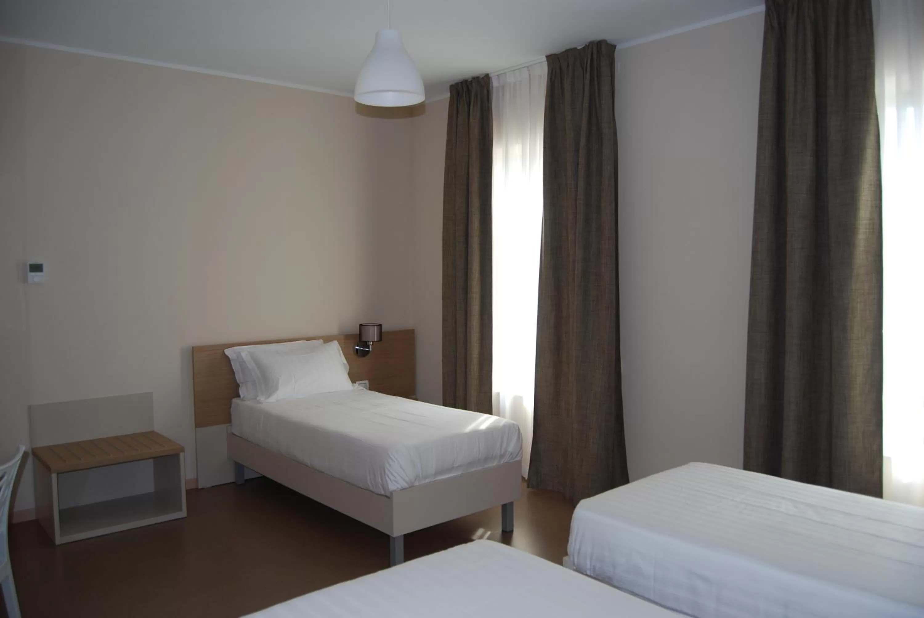 Photo of the whole room, Bed in Nuovo Albergo Operai