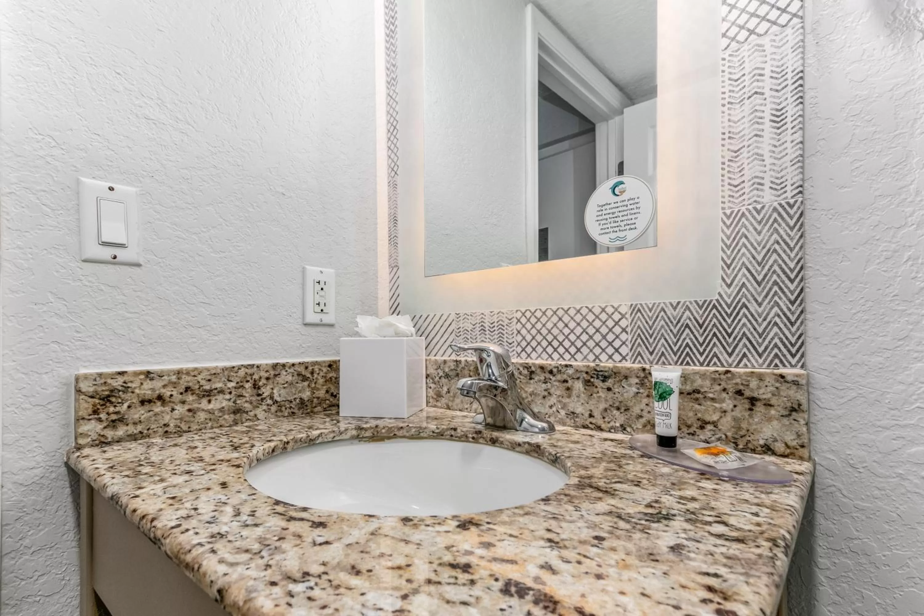 Bathroom in Dolphin Sands Clearwater Beach, an Ascend Collection Hotel