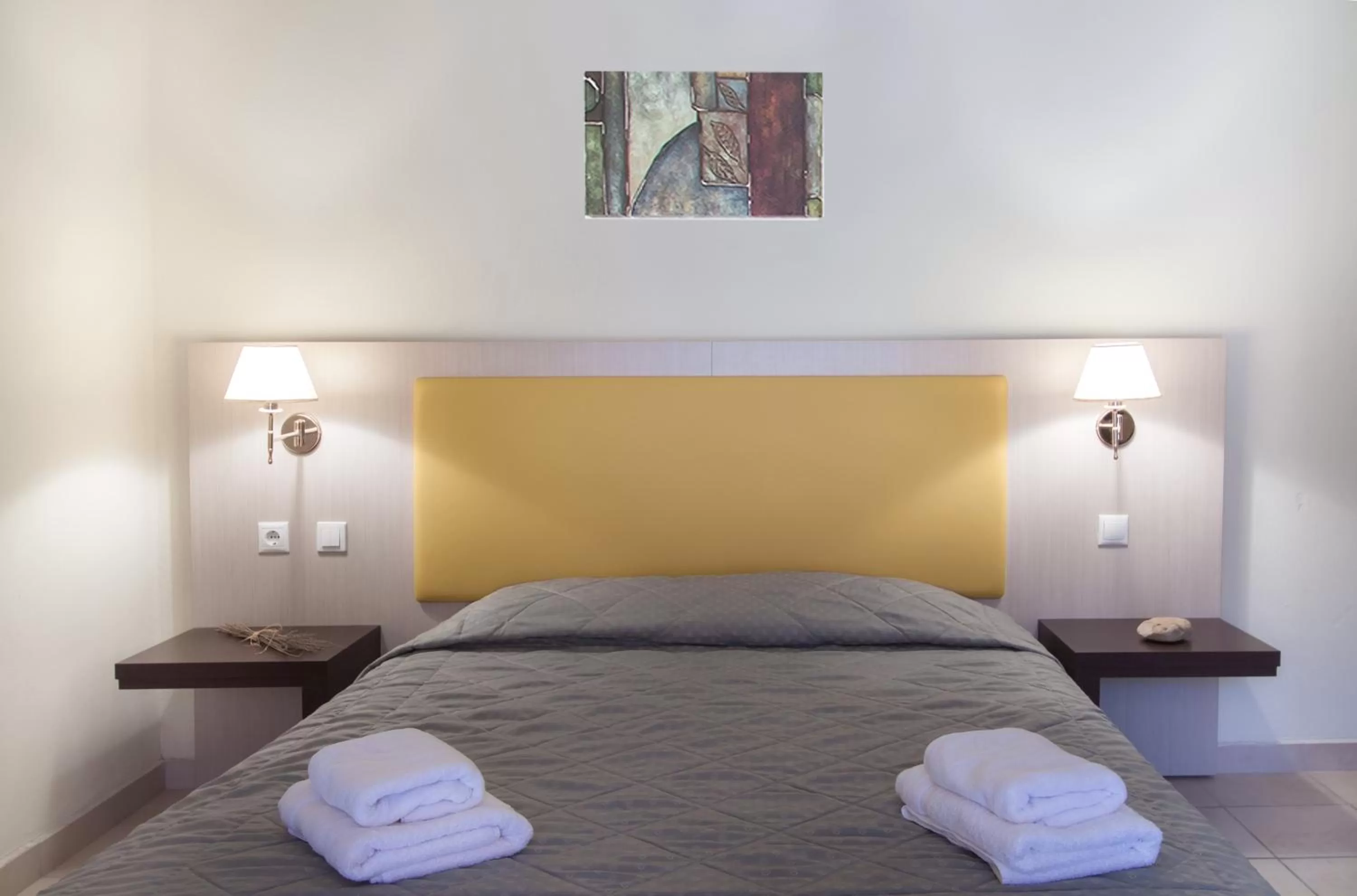 Bed in Rigas Hotel Skopelos