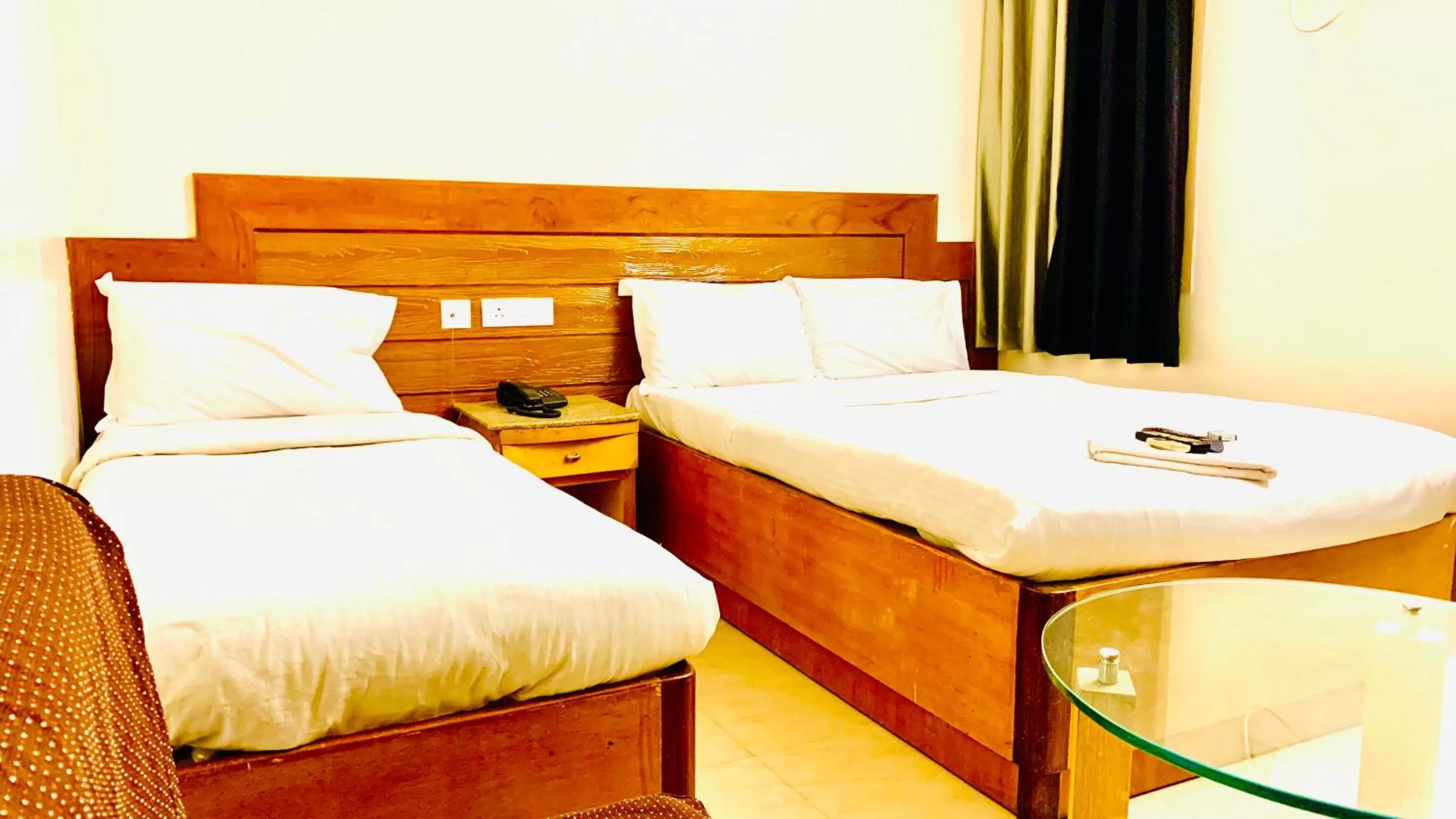 Bed in Half Moon Palace Chennai