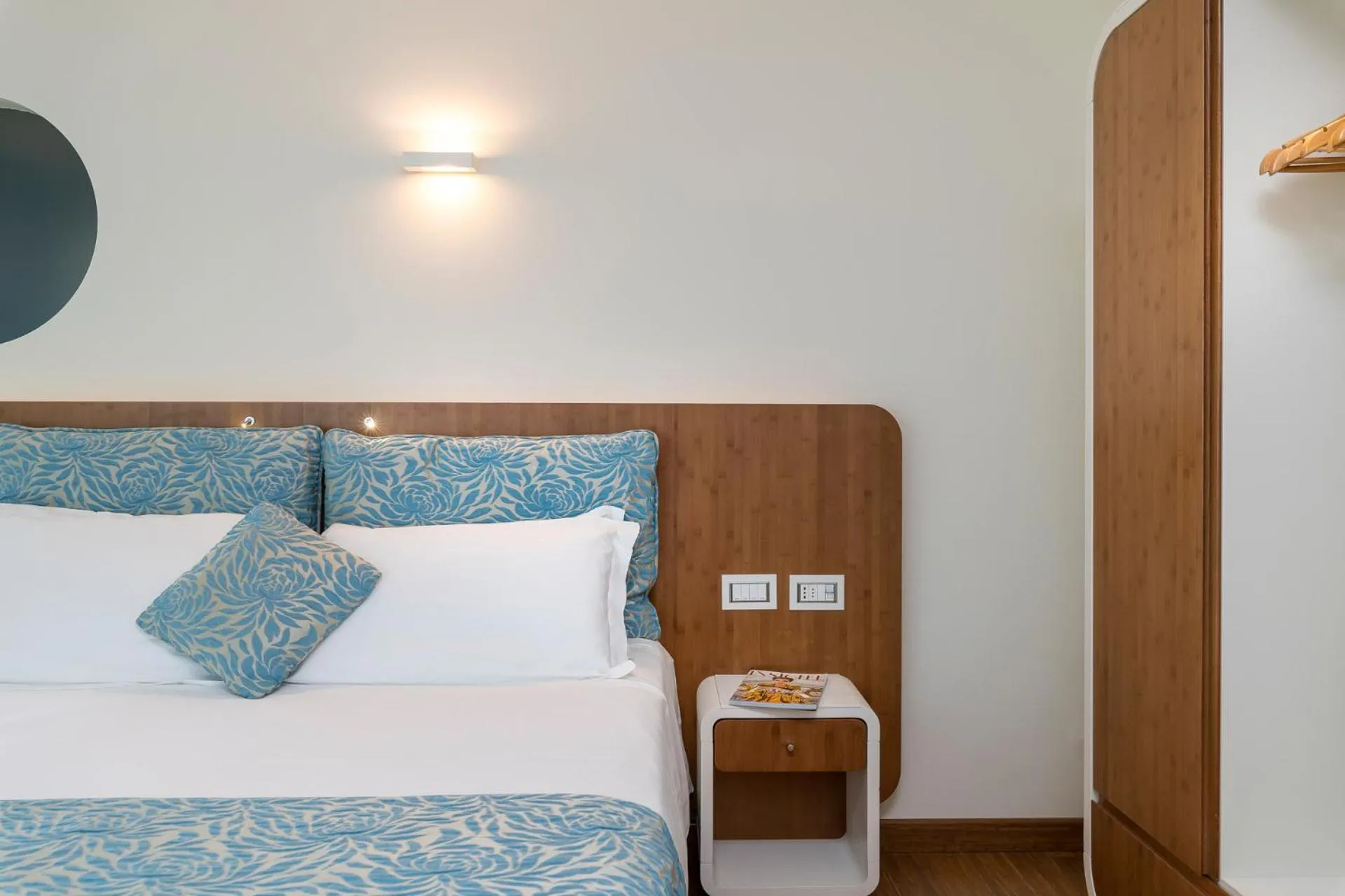 Bed in T-Suite Hotel