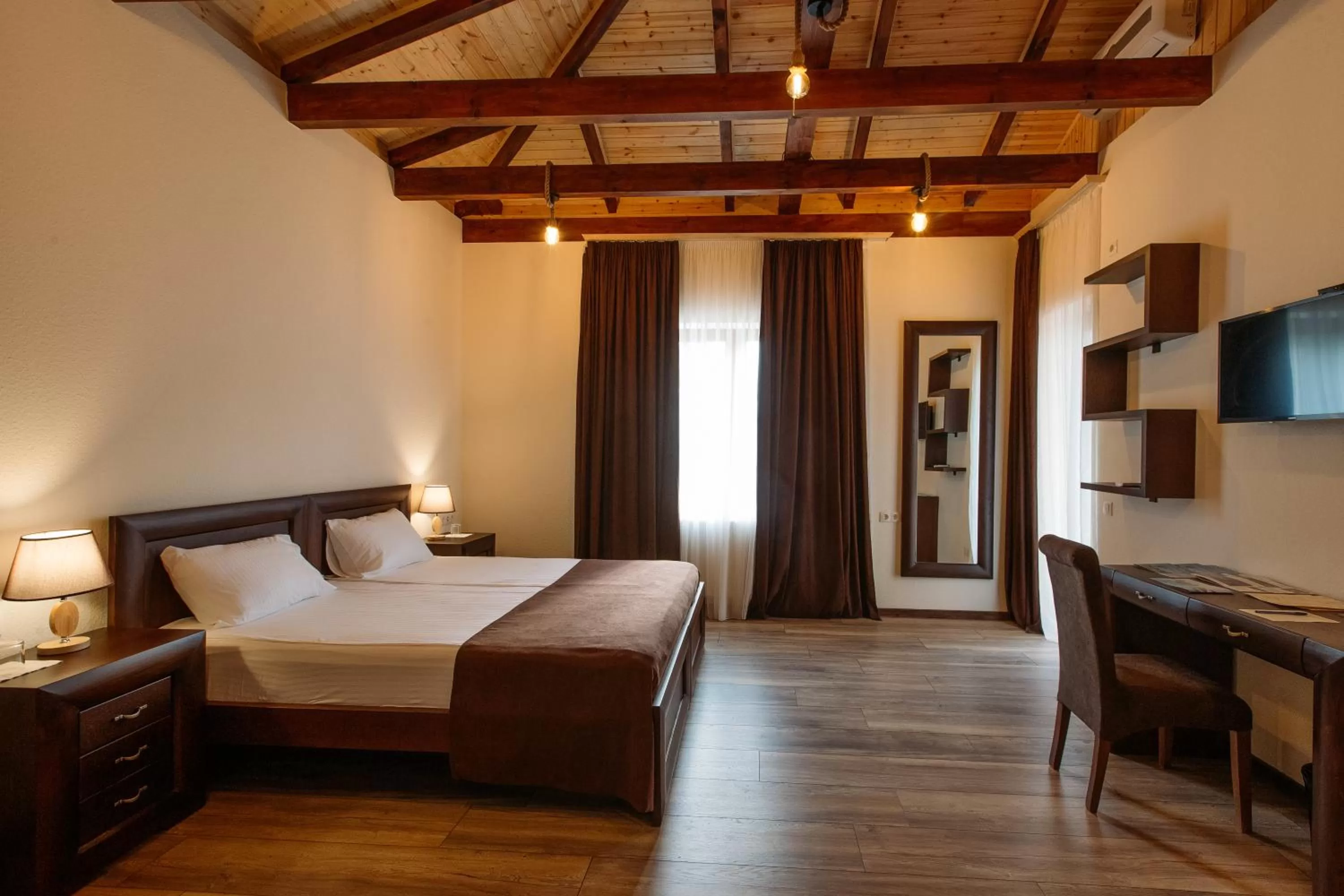 Communal lounge/ TV room, Bed in Schuchmann Wines Château,Villas & SPA