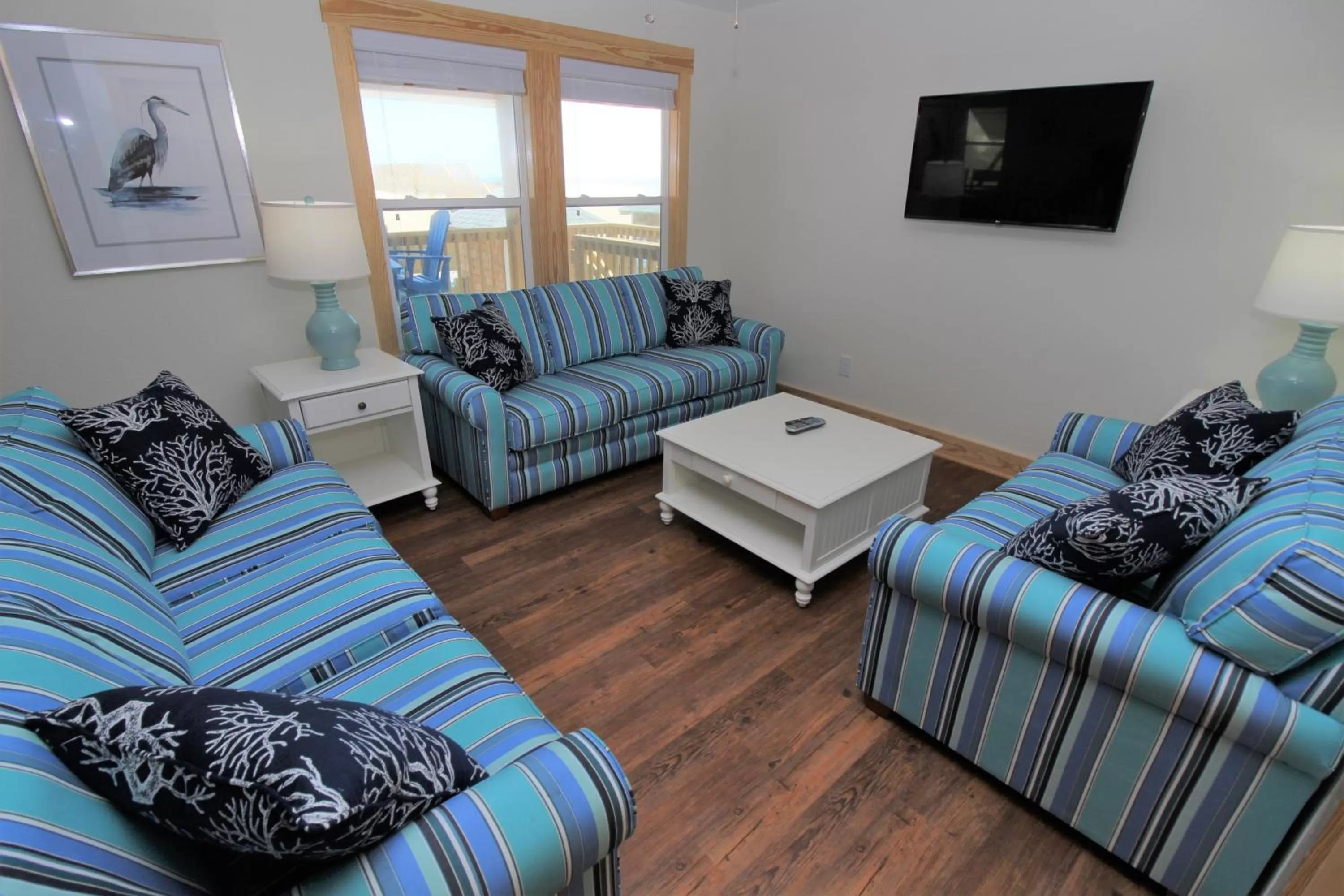 Living room in Whalebone Ocean Cottages by KEES Vacations