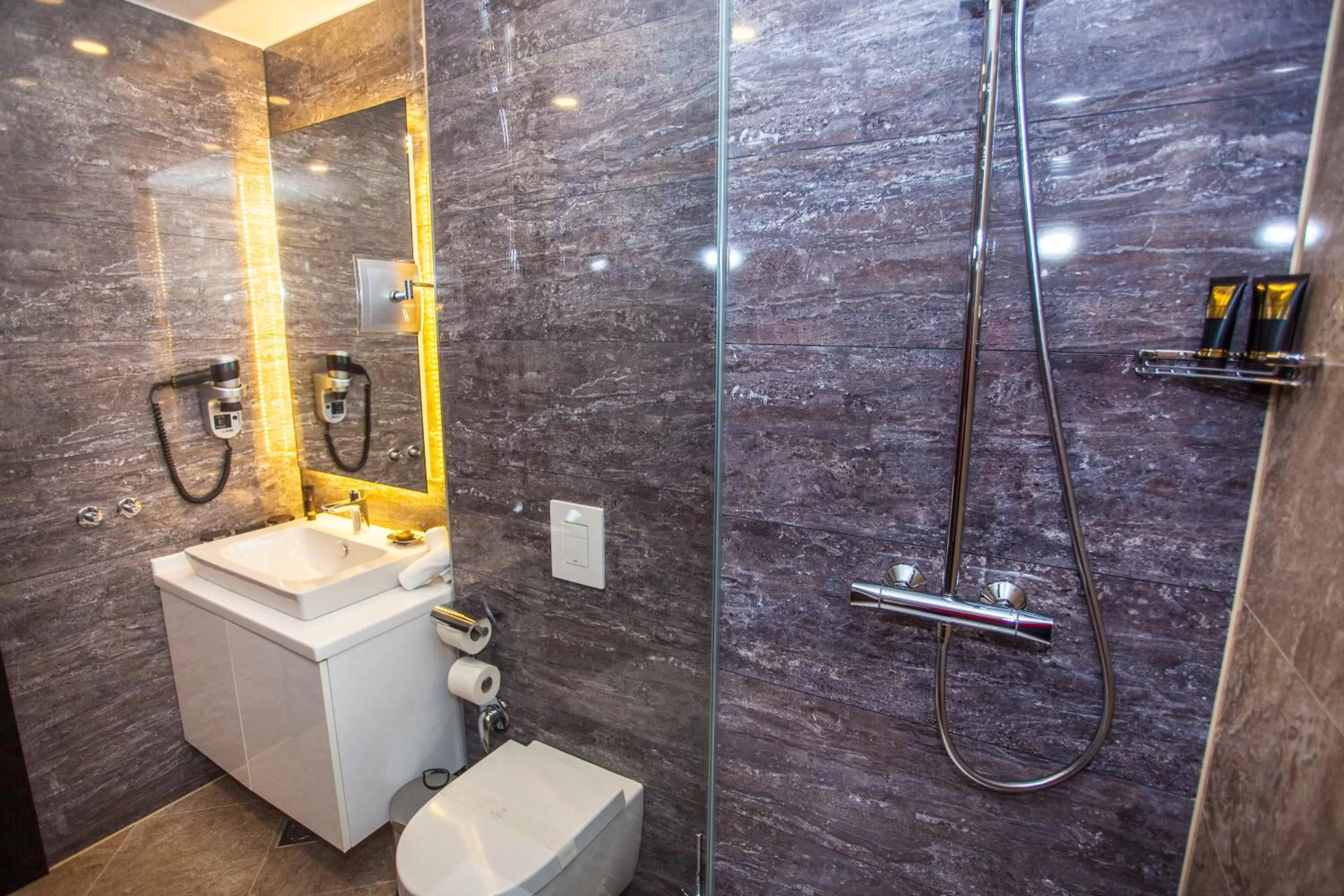 Bathroom in Malak Regency Hotel