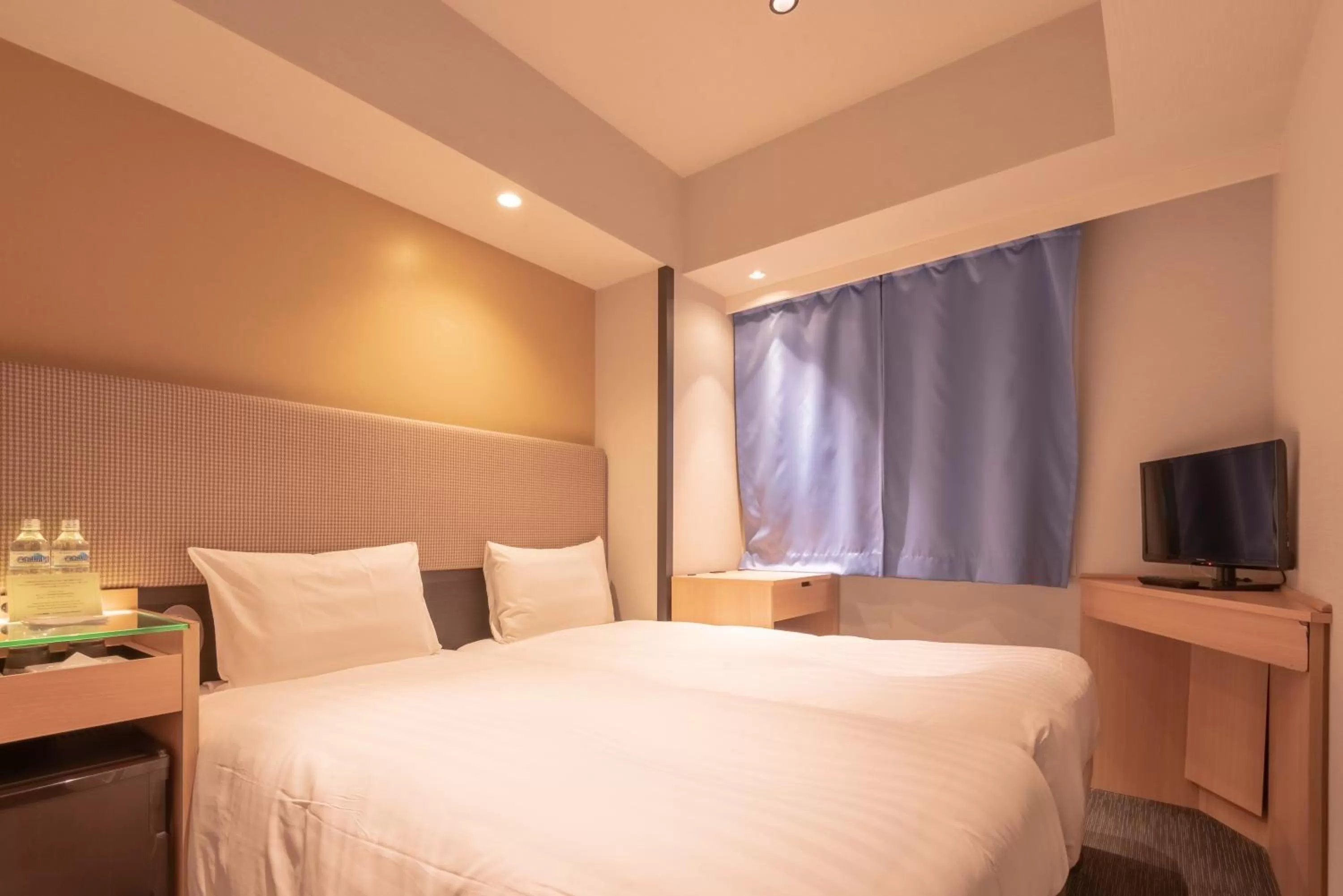 Bed in E Hotel Higashi Shinjuku