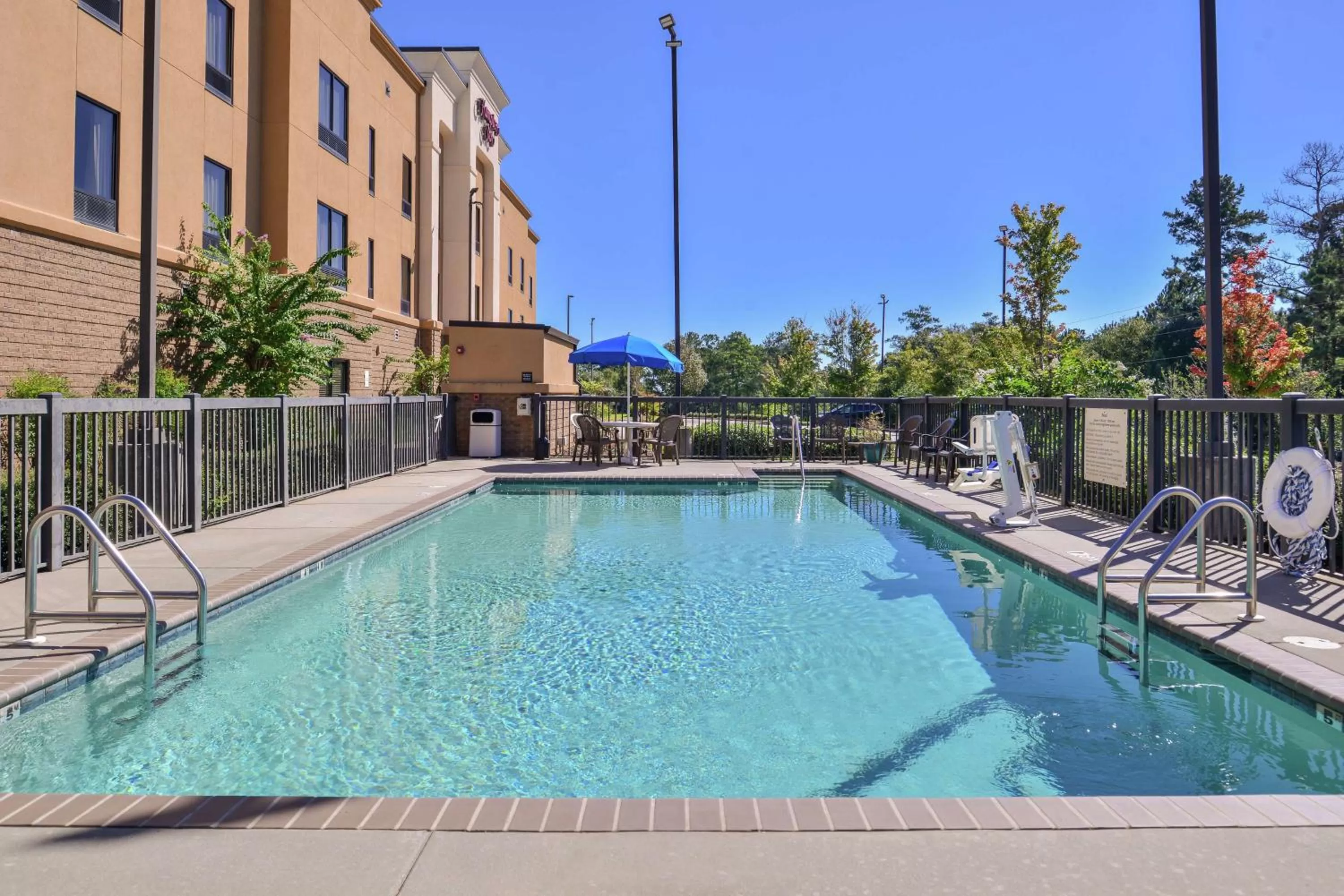 Pool view in Hampton Inn Jackson-College Avenue