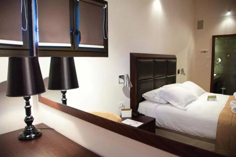 Bed in Kalavrita Canyon Hotel & Spa