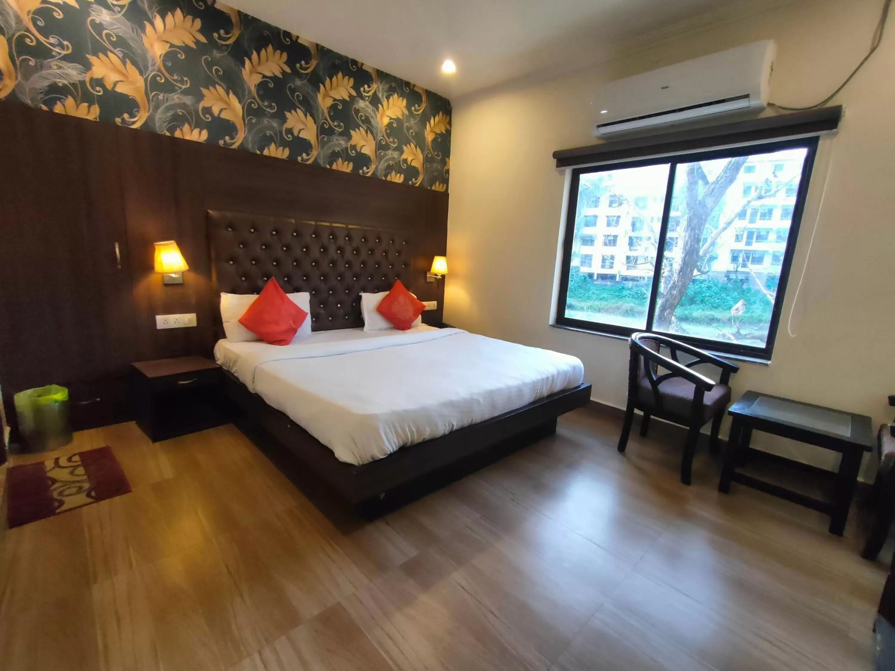 Photo of the whole room, Bed in Tapasthali by Meera Hotels