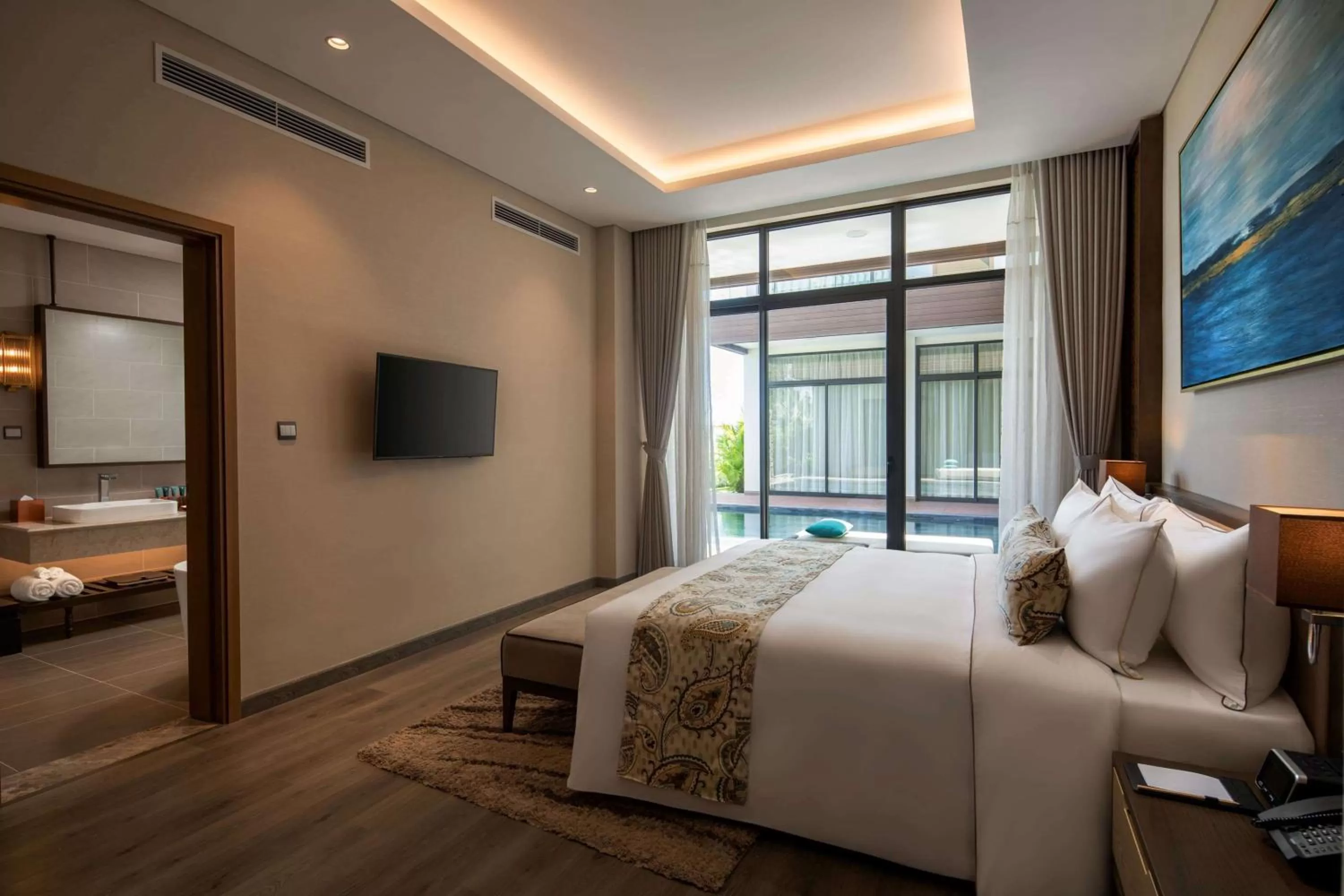 Photo of the whole room, Bed in Wyndham Grand KN Paradise Cam Ranh