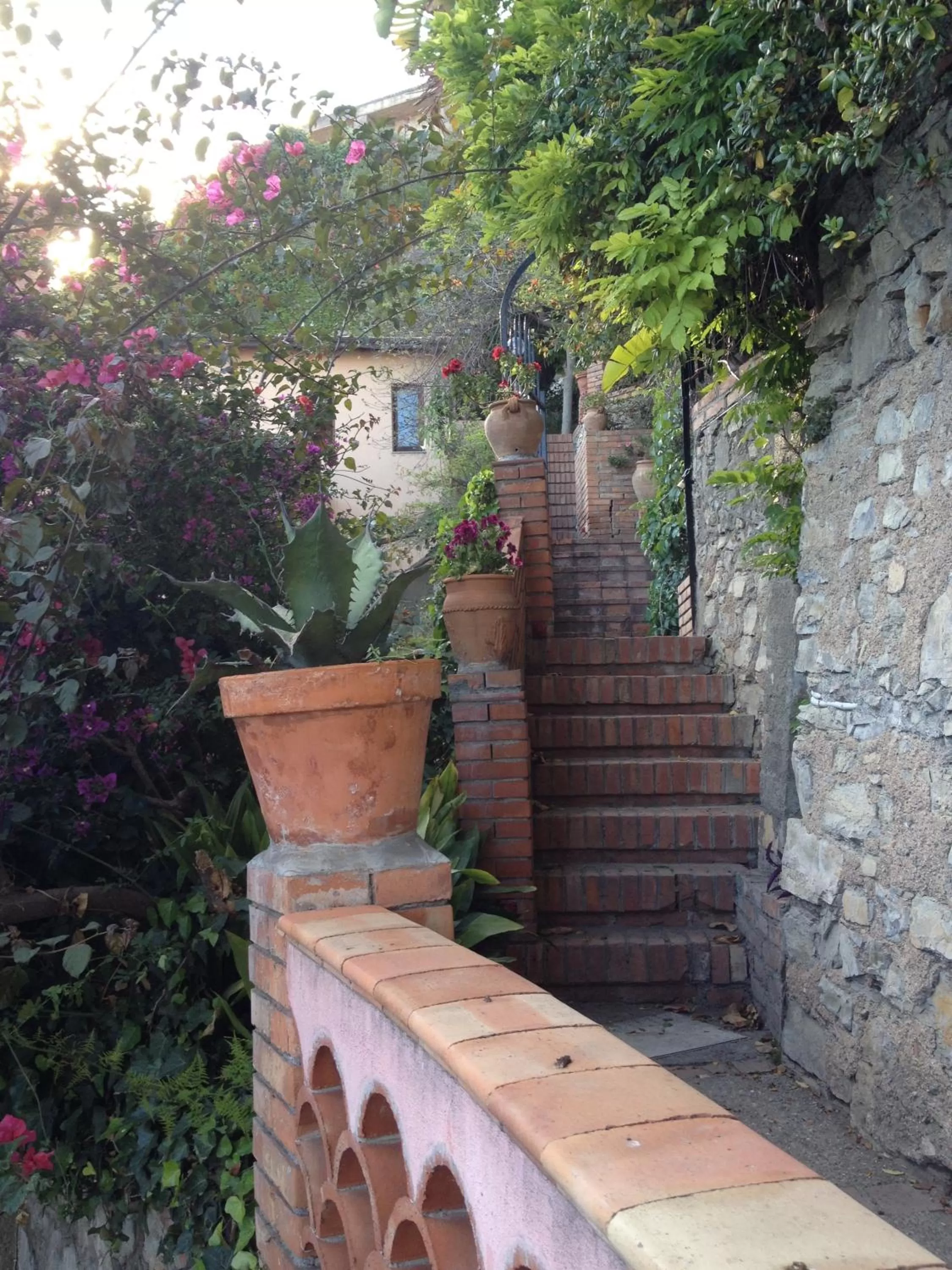 Garden in Villa Greta Hotel Rooms & Suites