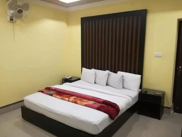 Bed in Hotel Grace inn