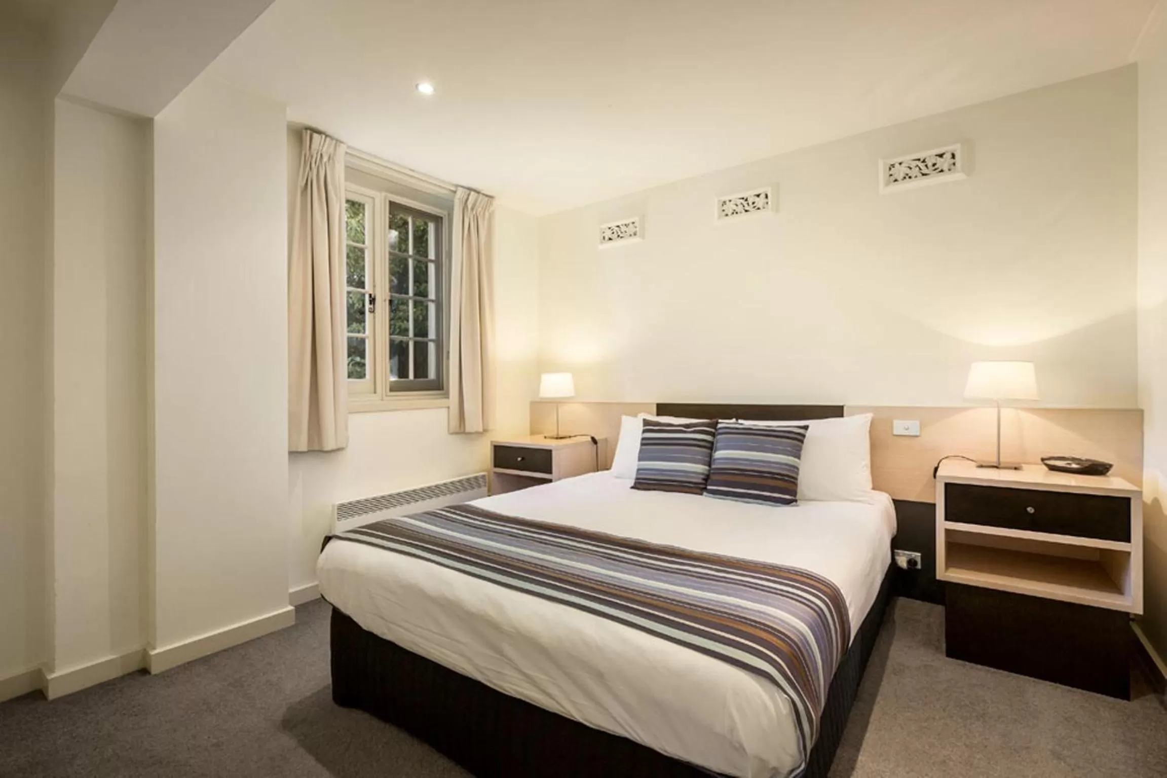 Bed in Quest Trinity House