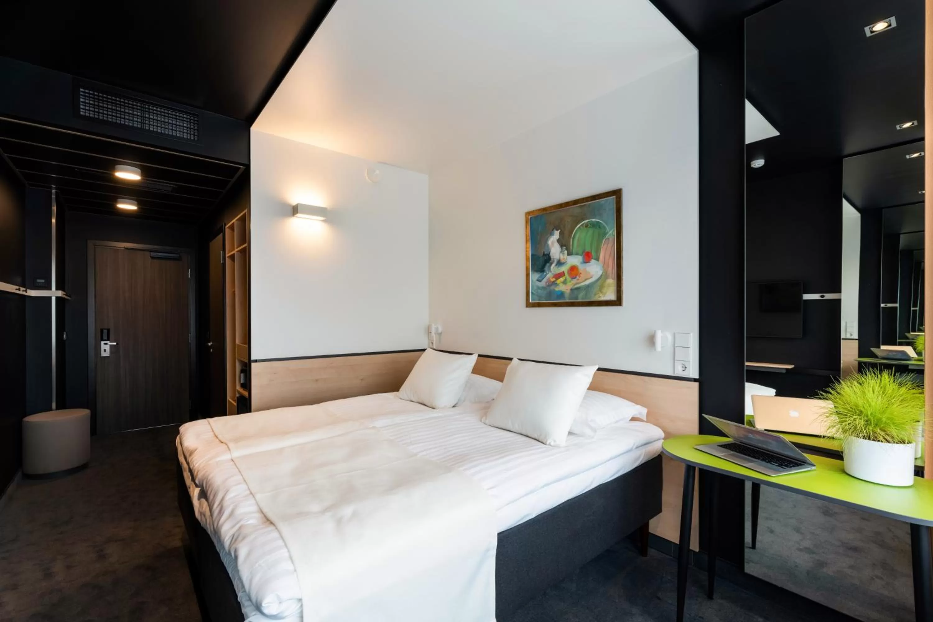 Bed in Art Hotel Pallas by Tartuhotels