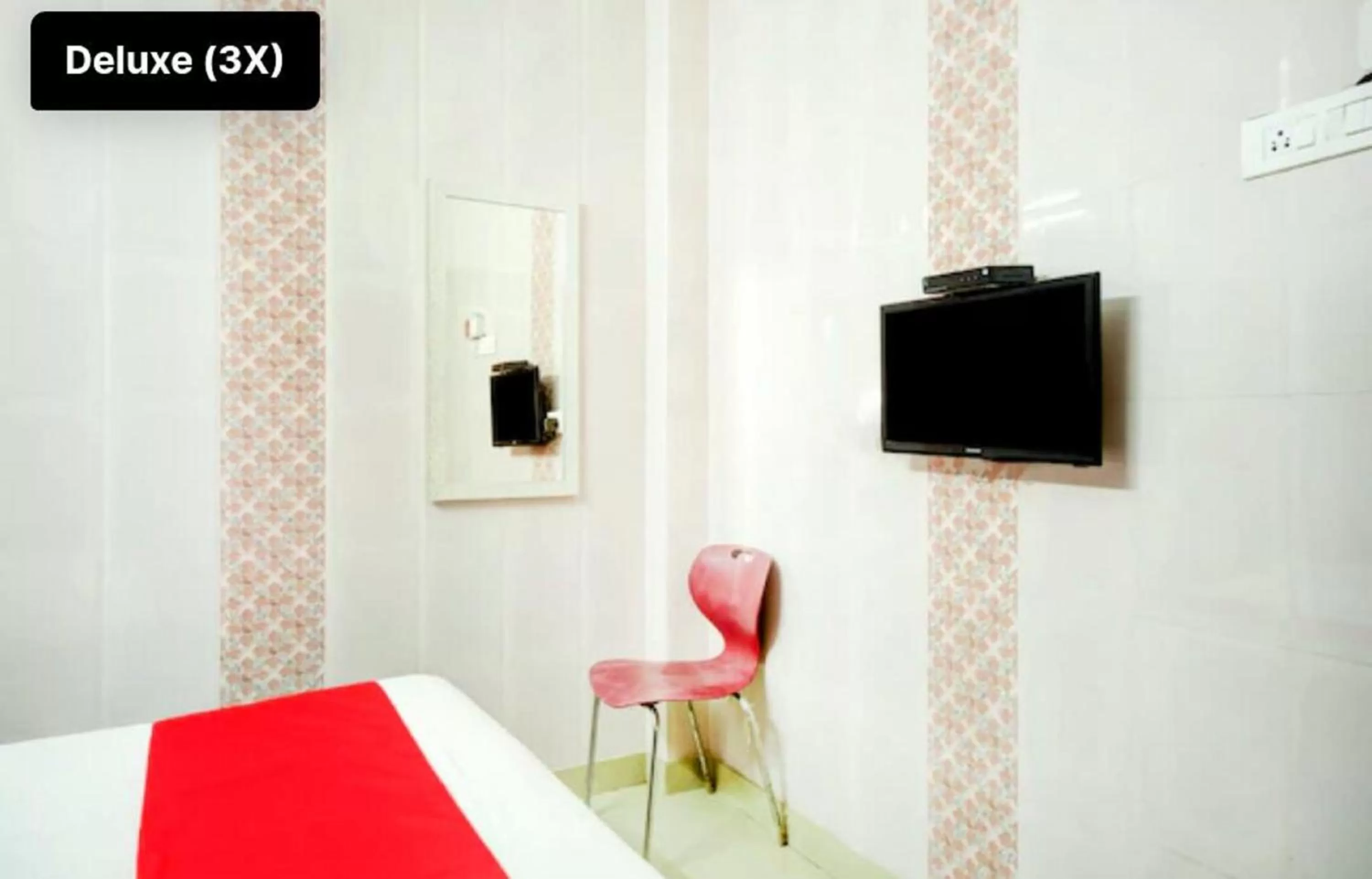 Bed in Silver Cloud Hotel Sholinganallur