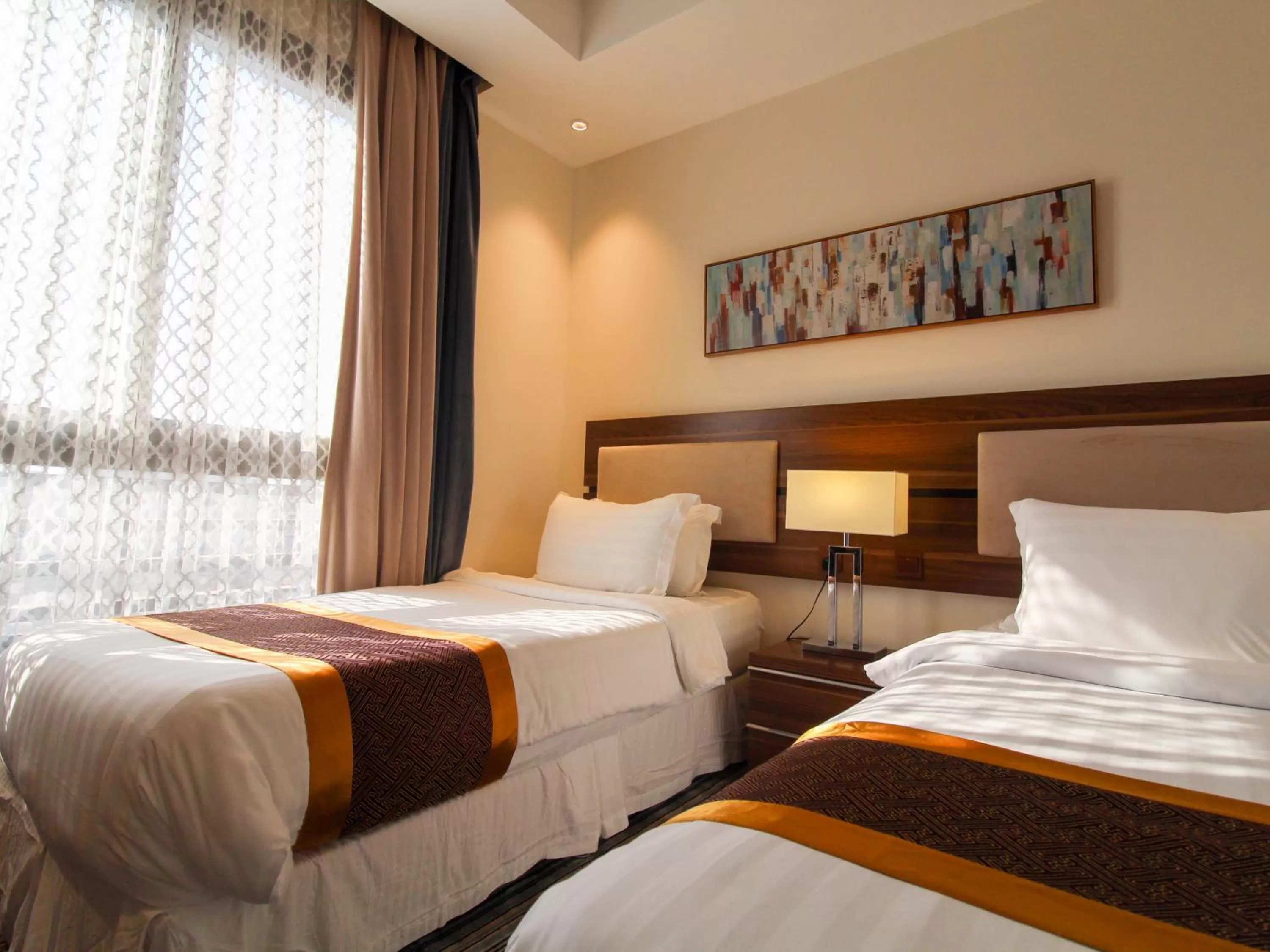 Bed in Friesian Hotel Suites