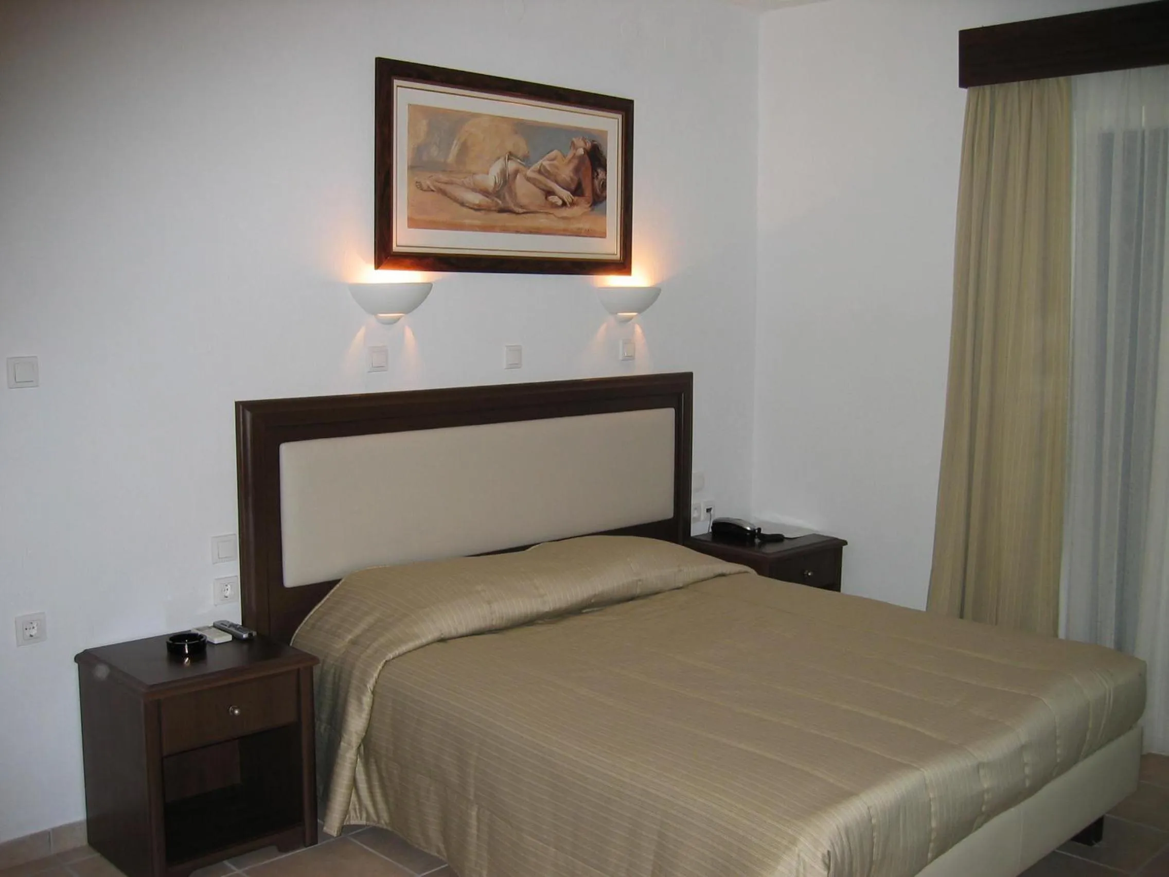 Bed in Giannoulaki Hotel