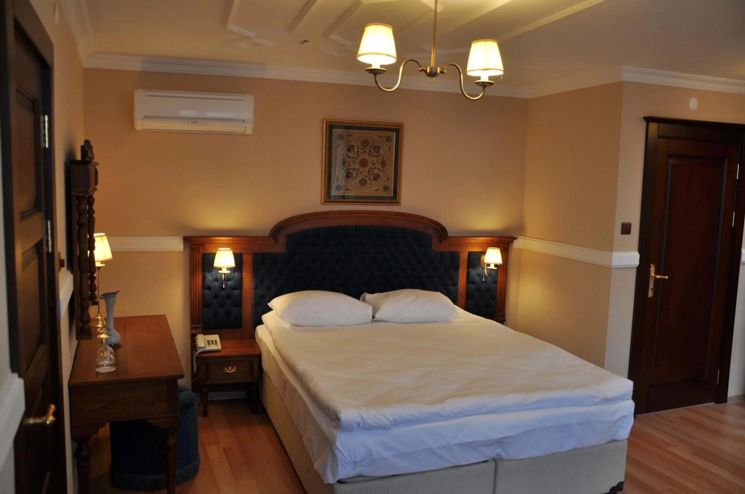 Bed in Aruna Boutique Hotel