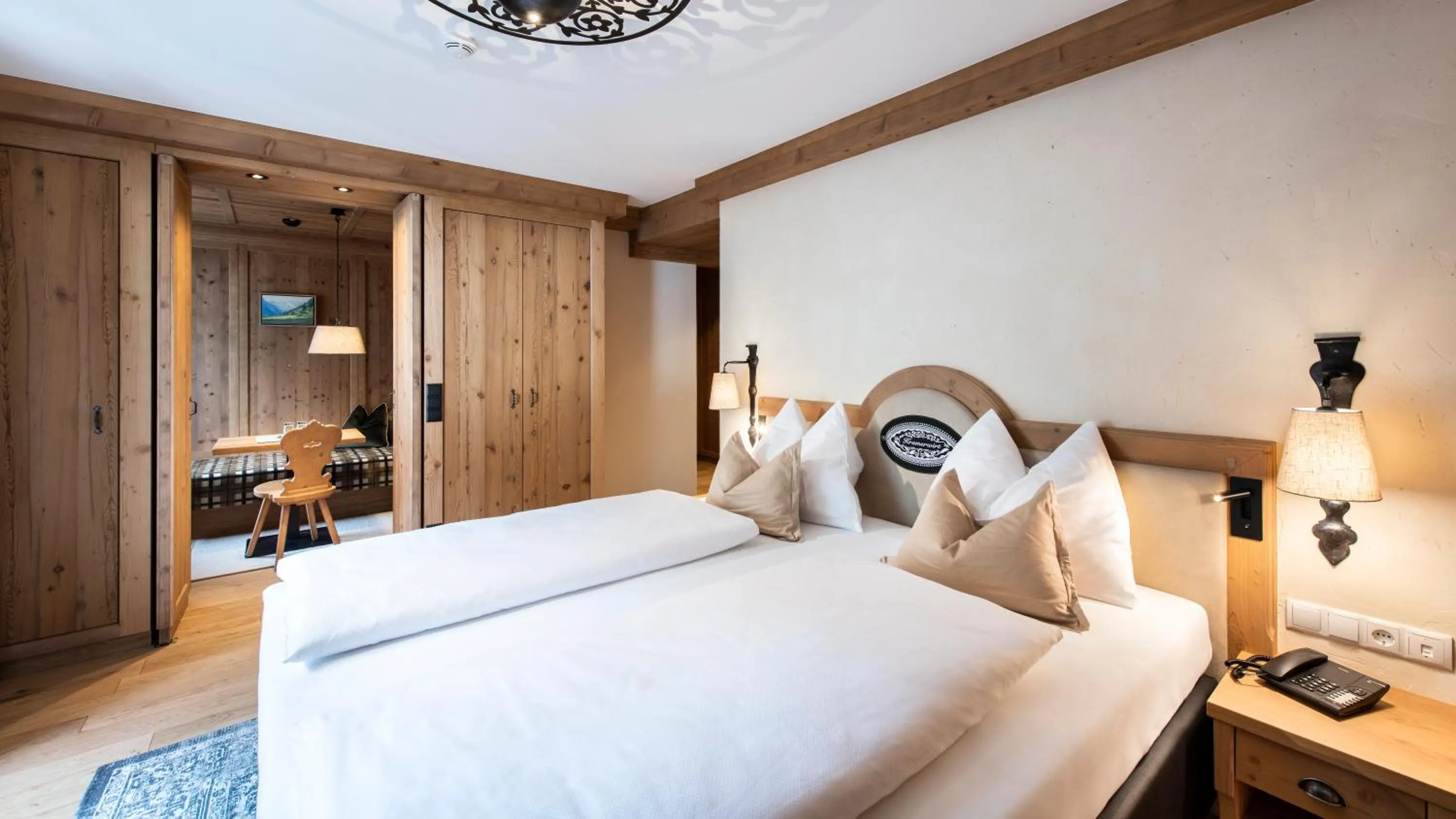 Photo of the whole room, Bed in Alpenhotel Kramerwirt